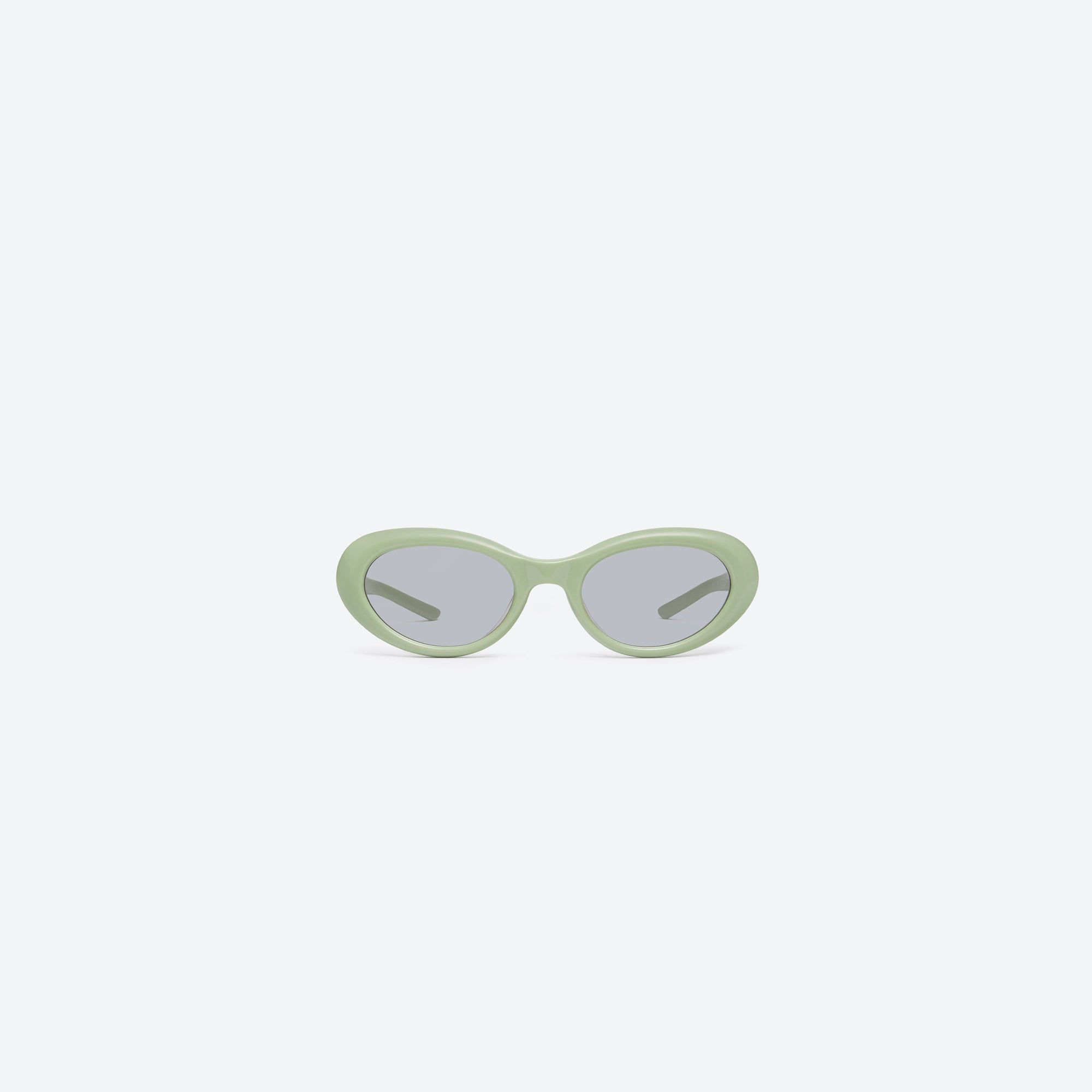 A front view of Gentle Monster Avon GR8 Green Acetate framed Oval sunglasses.