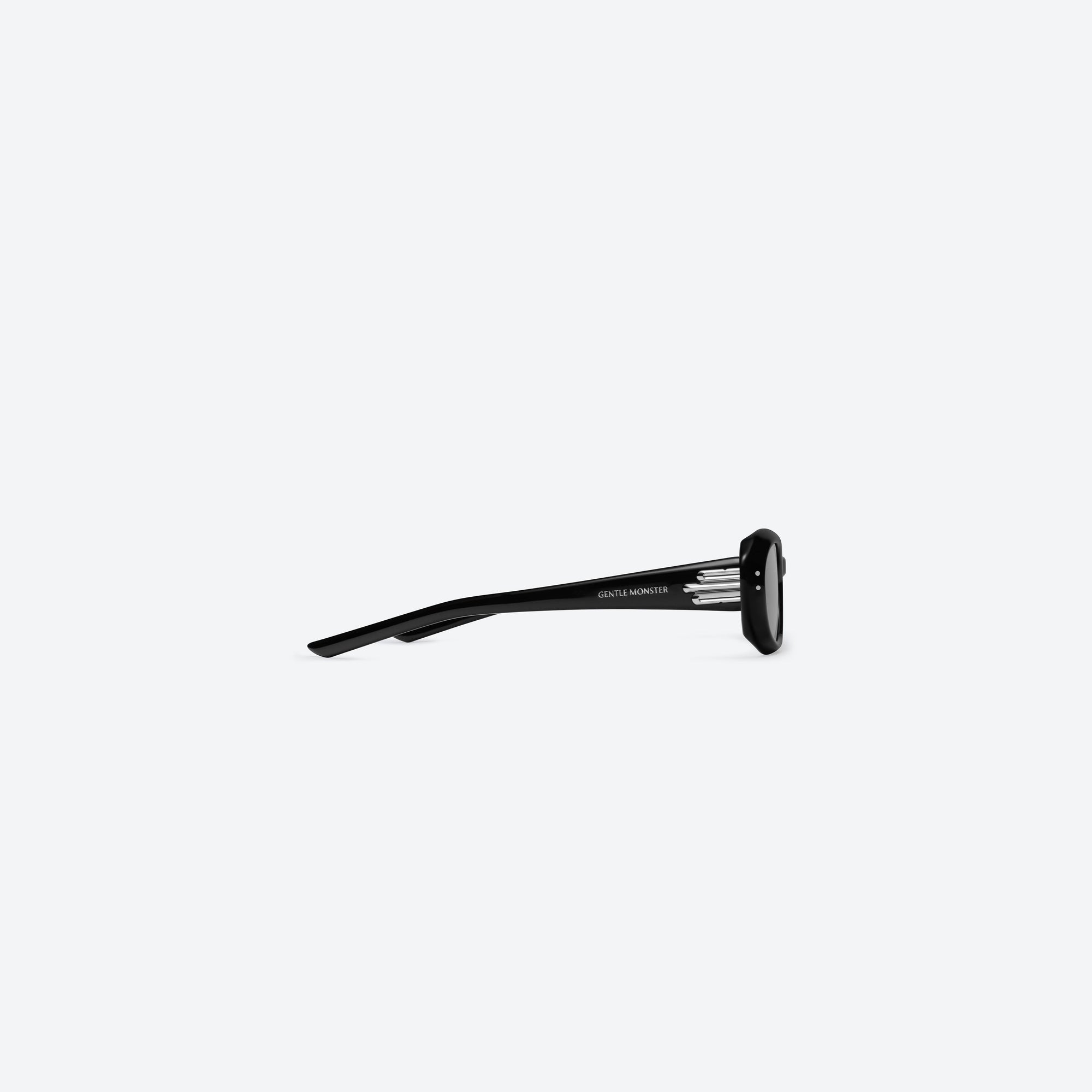 A detailed right view of Gentle Monster Blanc 01 Black Acetate framed Oval sunglasses.