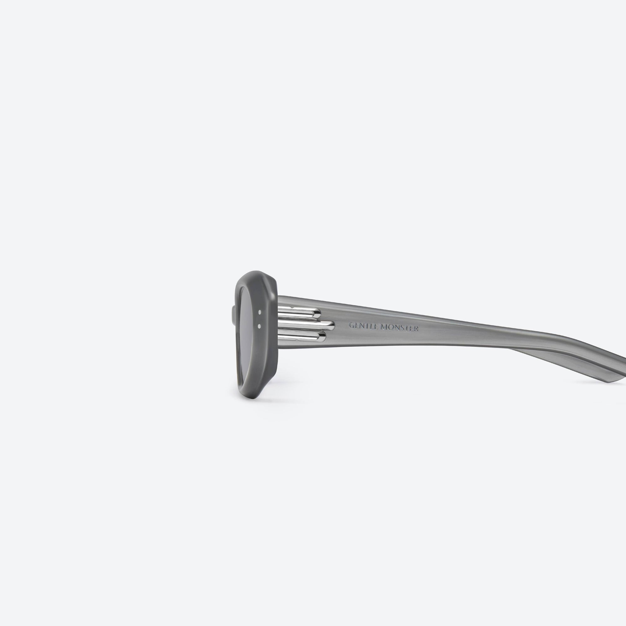 A detailed left view of Gentle Monster Blanc G13 Gray Acetate framed Oval sunglasses.