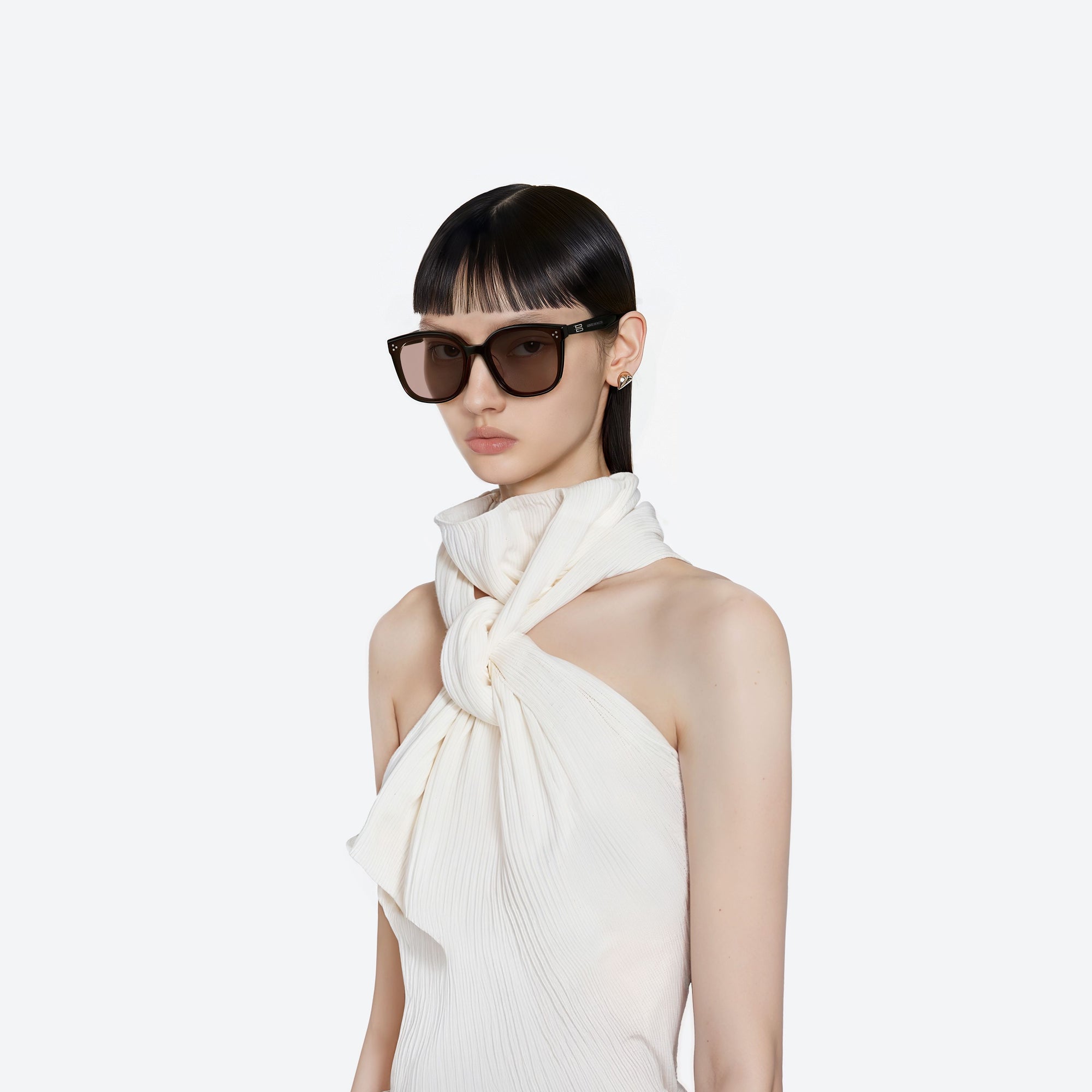 Model wearing the By 01(OR) Black Acetate framed Square sunglasses.