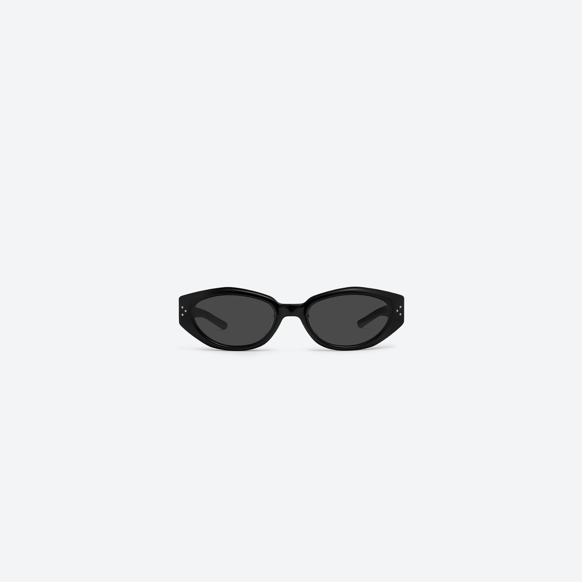 A front view of Gentle Monster Dada 01 Black Acetate framed Oval sunglasses.