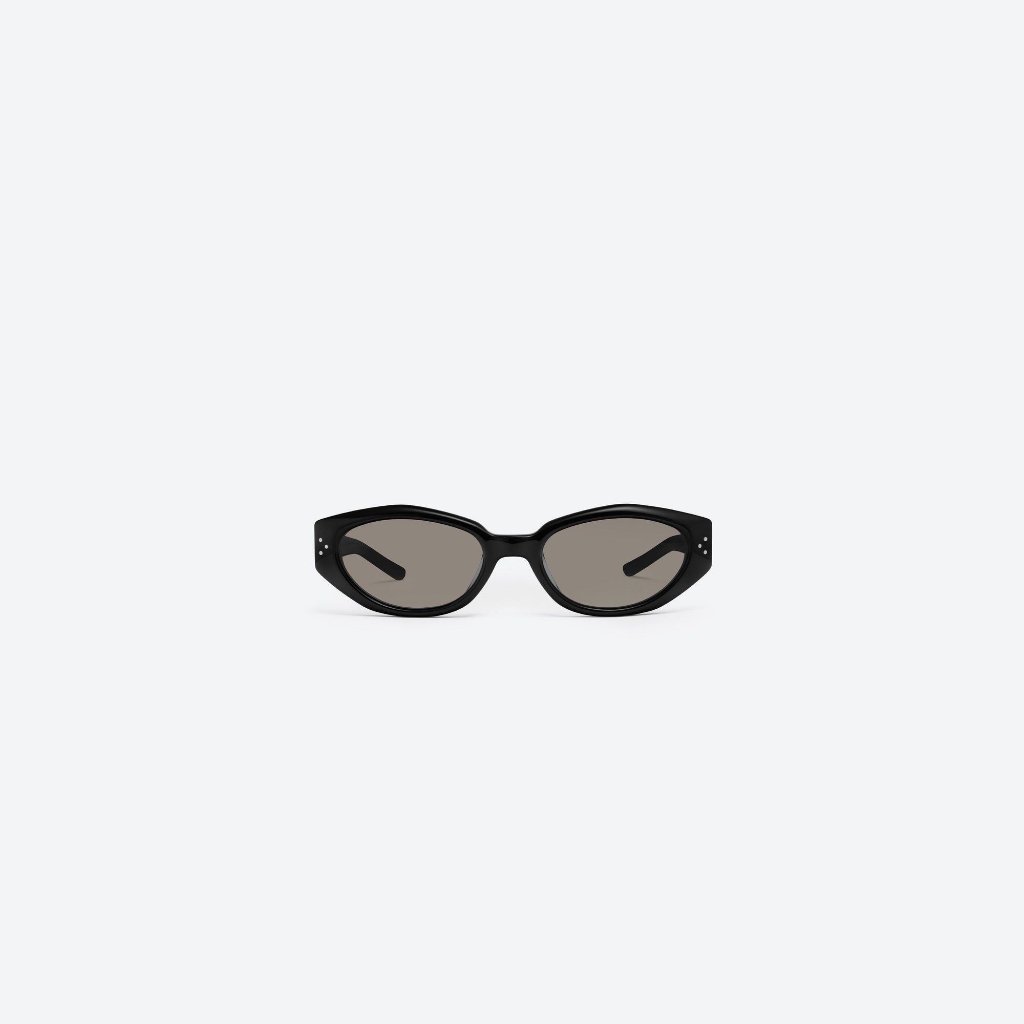 A front view of Gentle Monster Dada 01(G) Black Acetate framed Oval sunglasses.