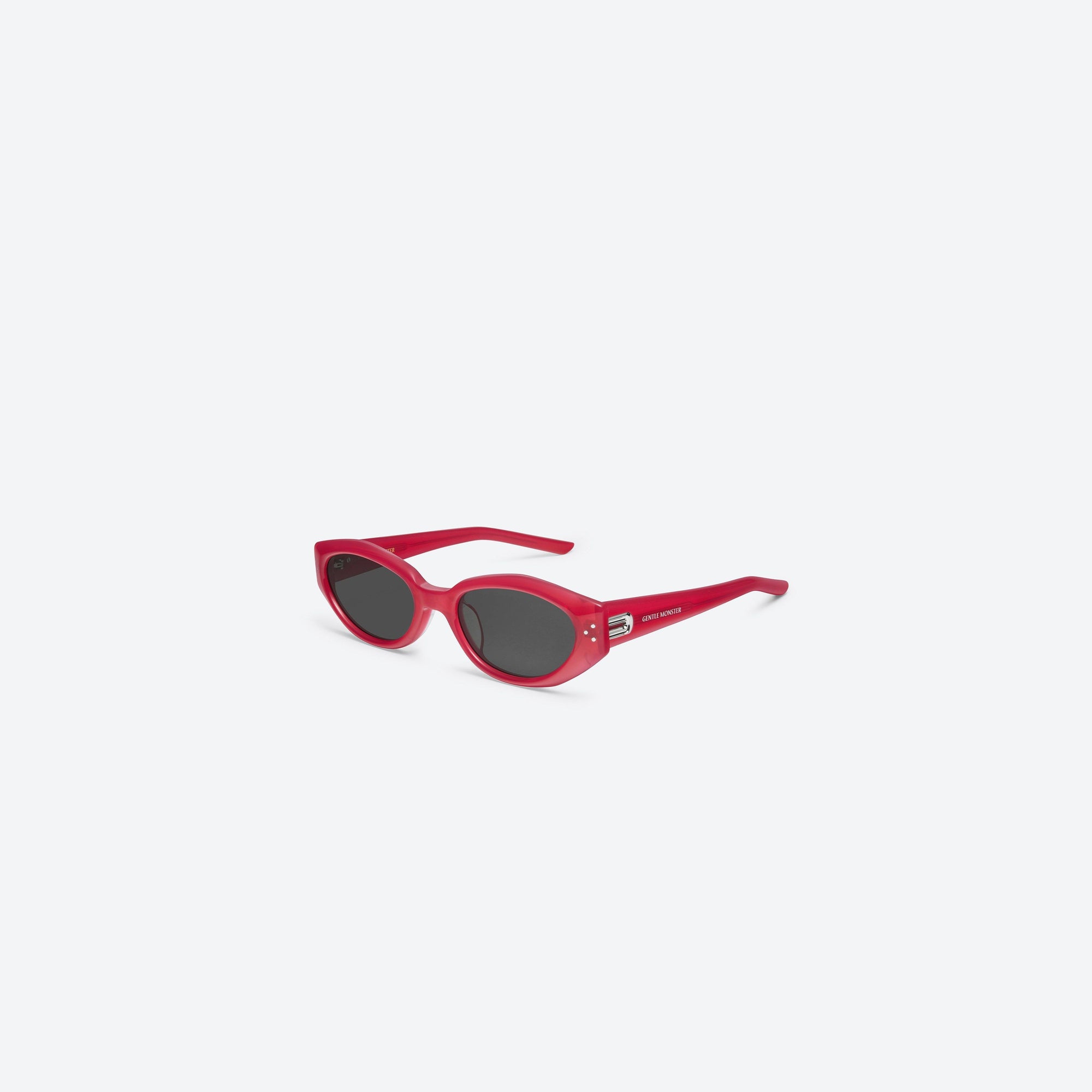 45-degree view of Gentle Monster Dada RC6 Red Acetate framed Oval sunglasses.