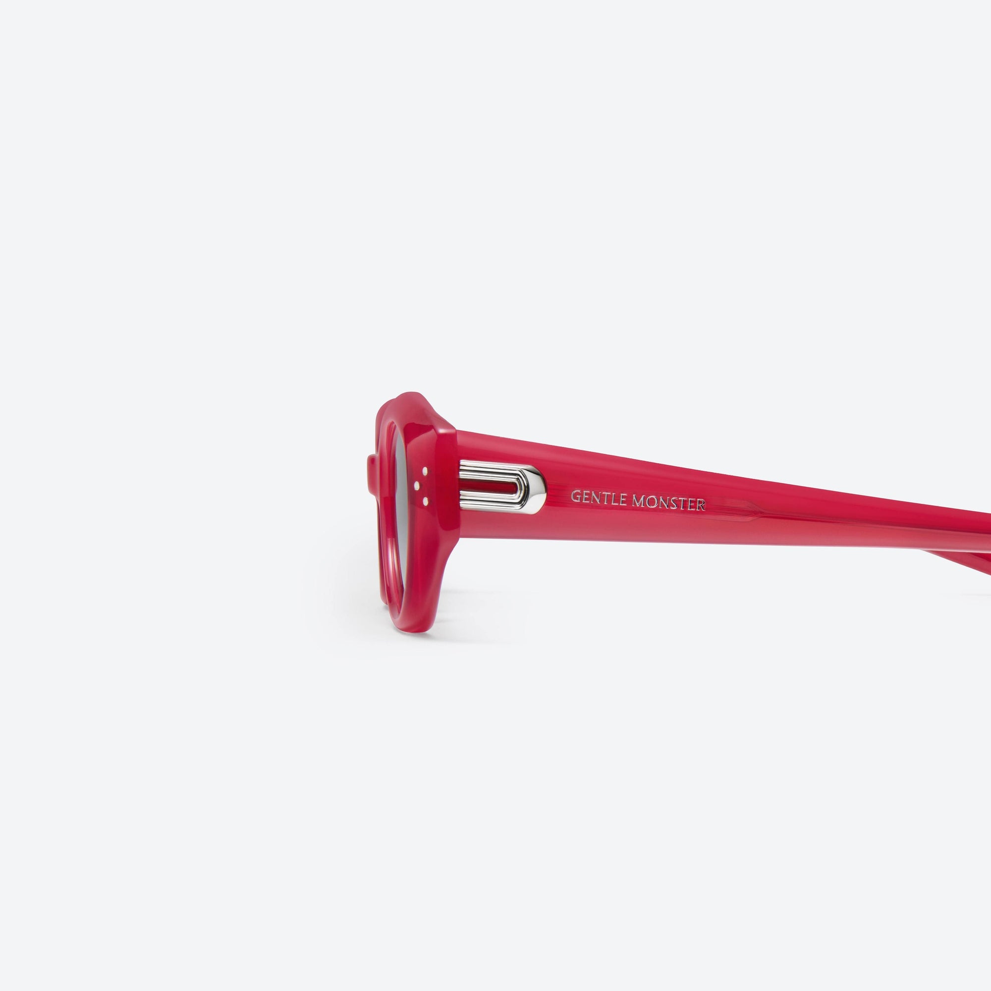 A detailed left view of Gentle Monster Dada RC6 Red Acetate framed Oval sunglasses.