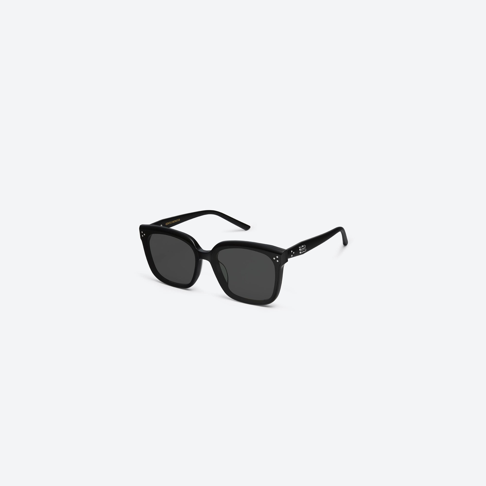 45-degree view of Gentle Monster Dear 01 Black Acetate framed Square sunglasses.
