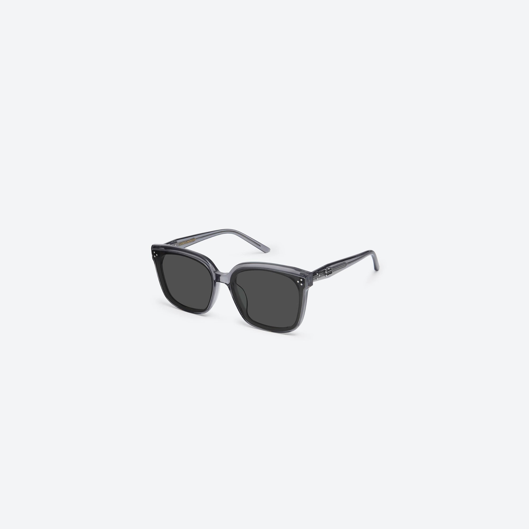 45-degree view of Gentle Monster Dear G1 Gray Acetate framed Square sunglasses.