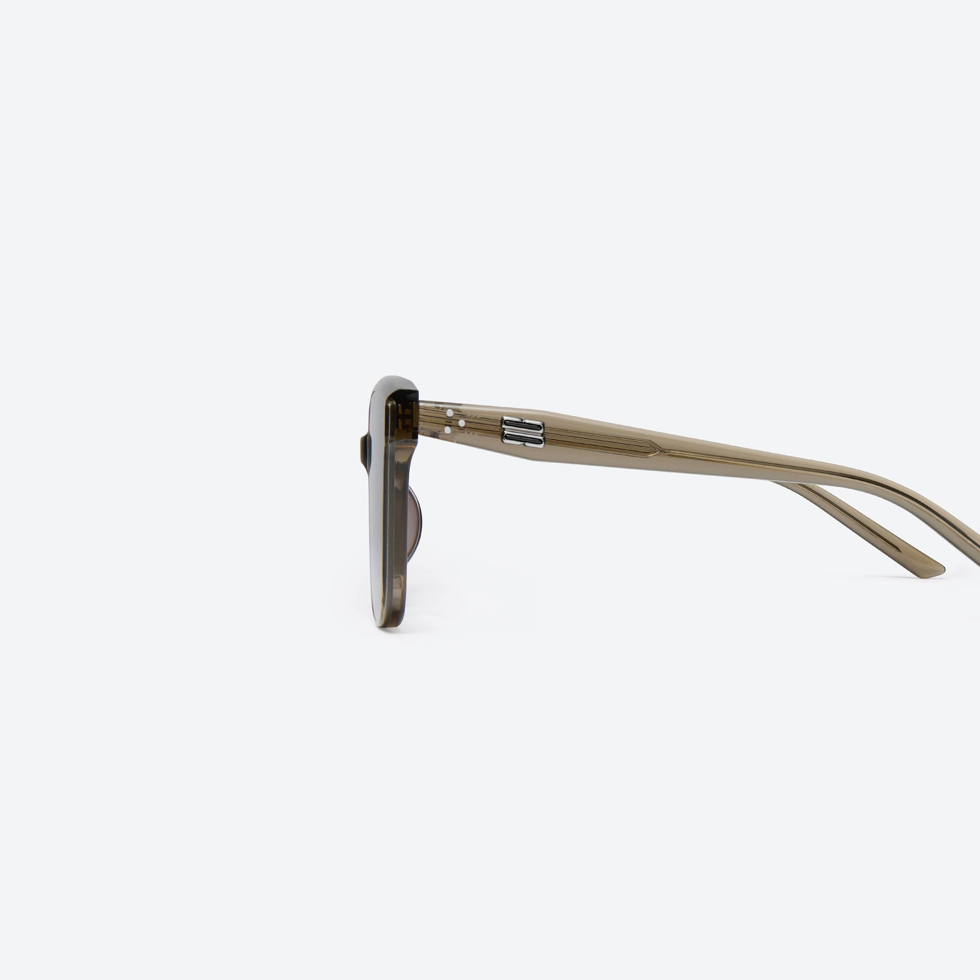 A detailed left view of Gentle Monster Dear KC6 Green Acetate framed Square sunglasses.
