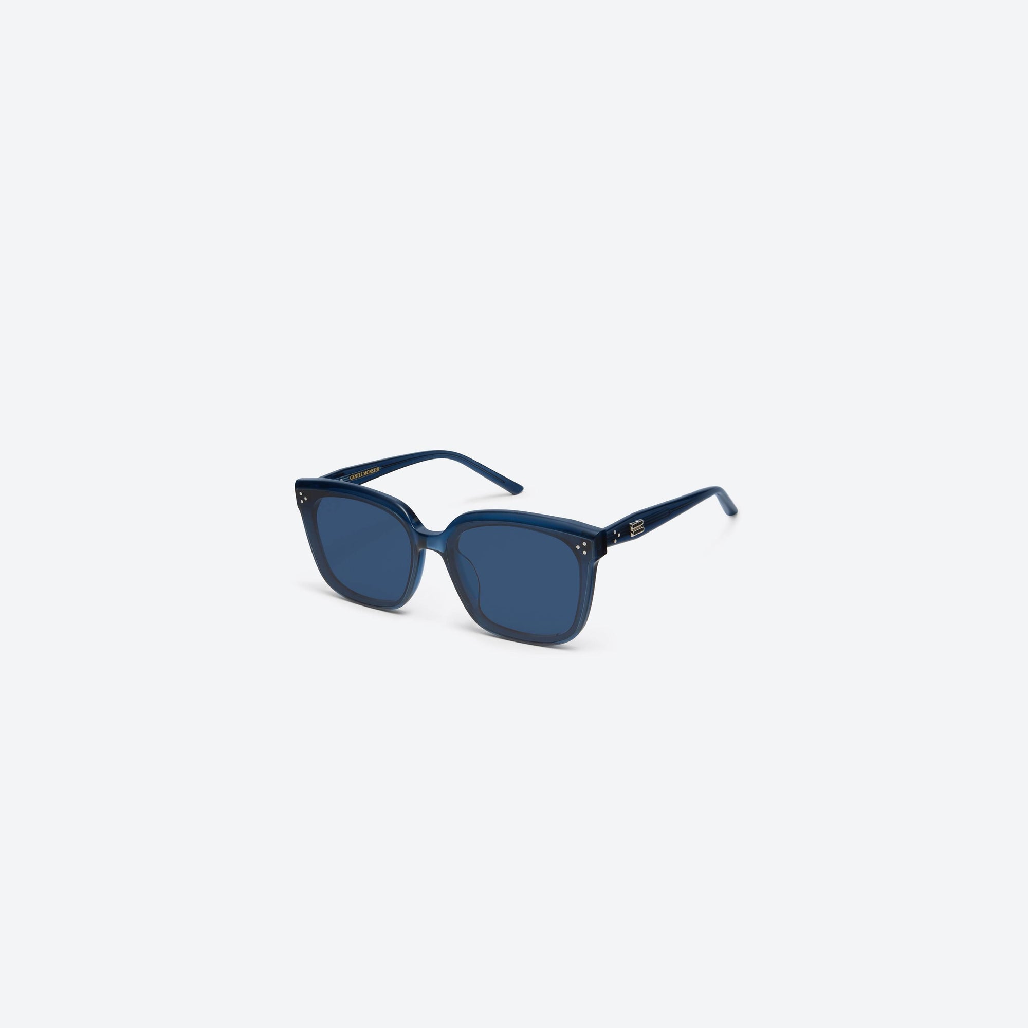 45-degree view of Gentle Monster Dear NC2 Blue Acetate framed Square sunglasses.