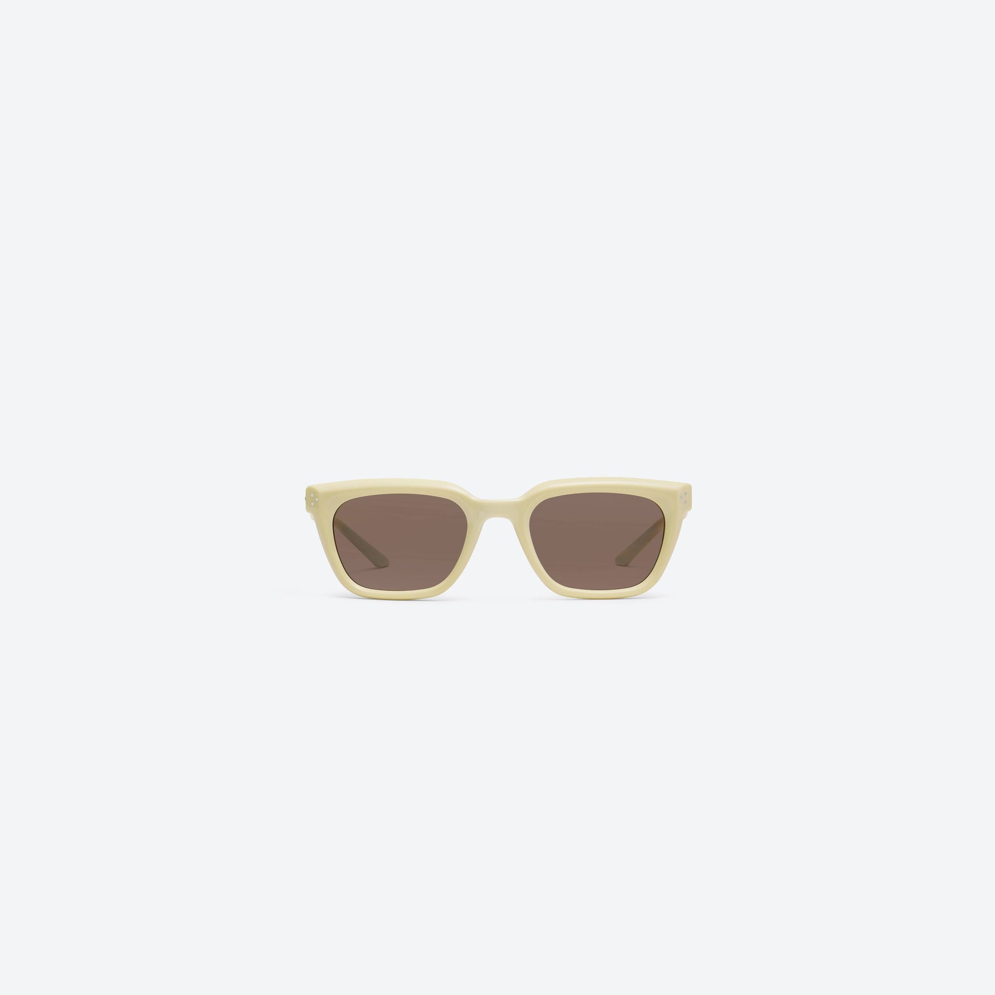 A front view of Gentle Monster Hovo Y5 Yellow Acetate framed Square sunglasses.
