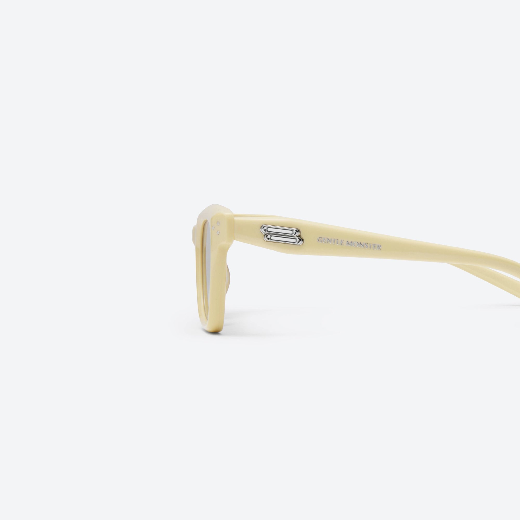 A detailed left view of Gentle Monster Hovo Y5 Yellow Acetate framed Square sunglasses.