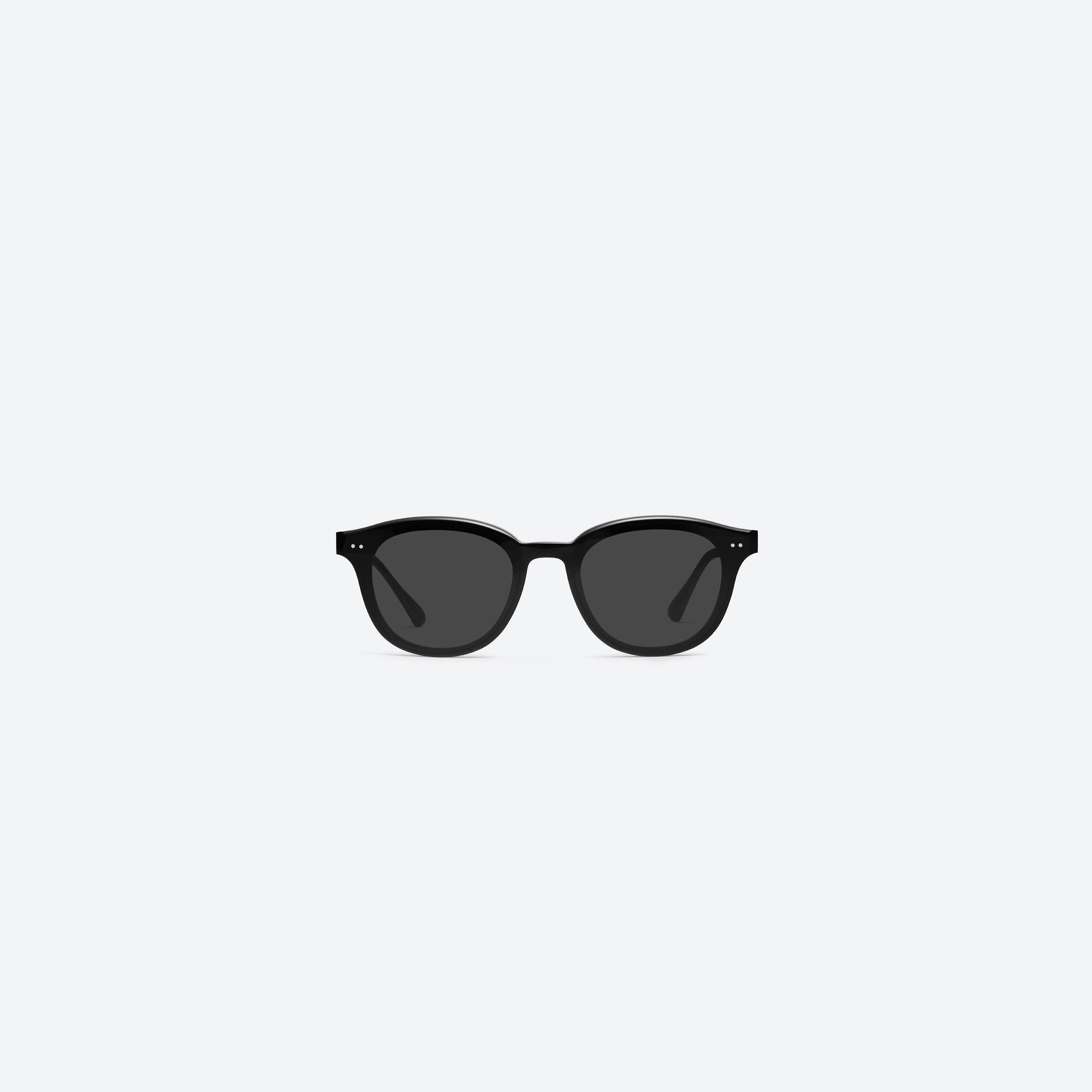 A front view of Gentle Monster Jade 01 Black Acetate framed Round sunglasses.
