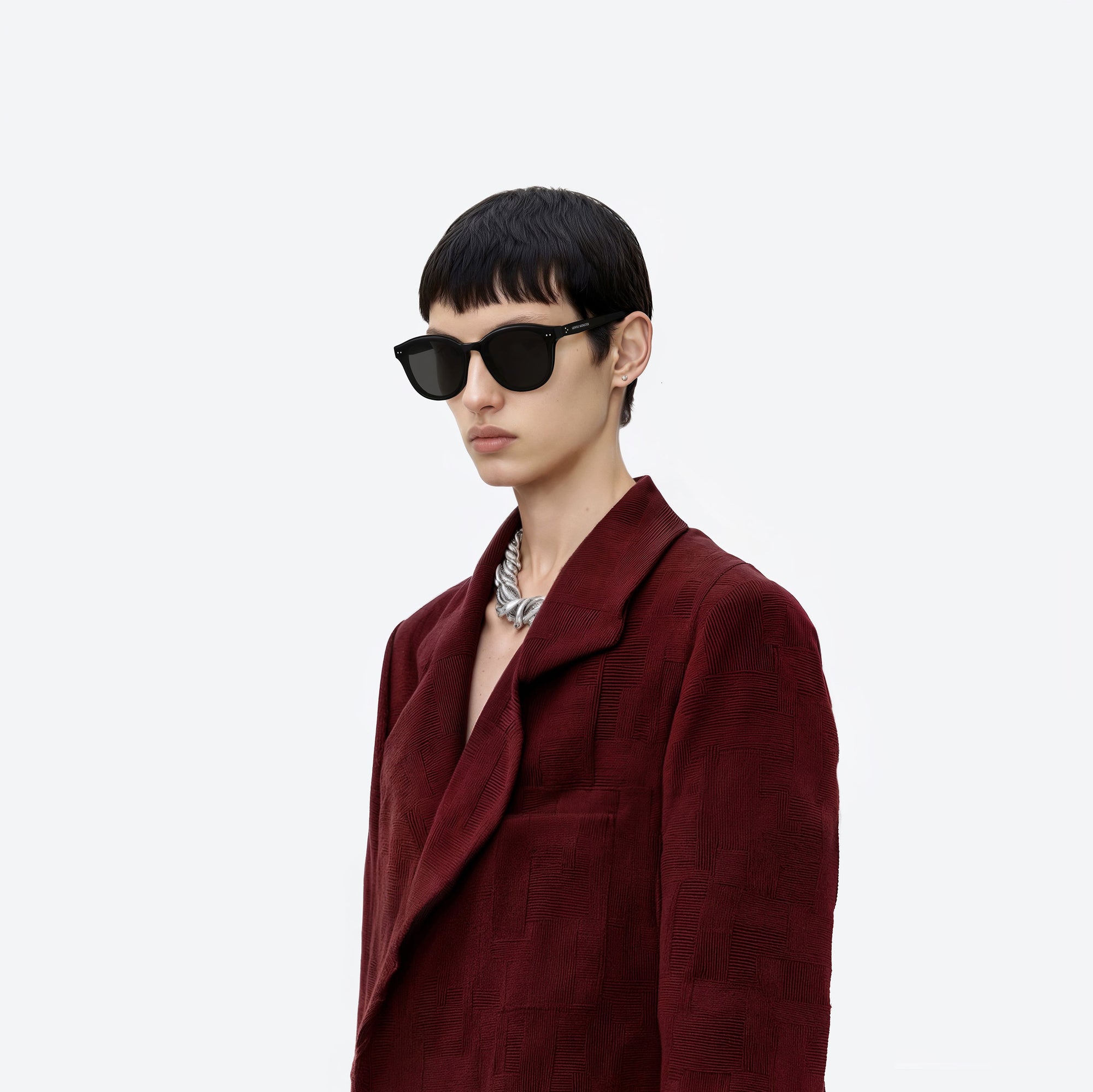 Model wearing the Jade 01 Black Acetate framed Round sunglasses.