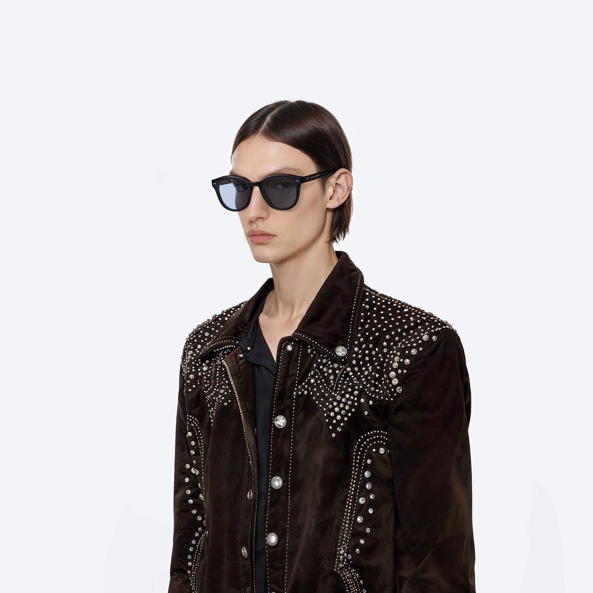 Model wearing the Jade 01(B) Black Acetate framed Round sunglasses.