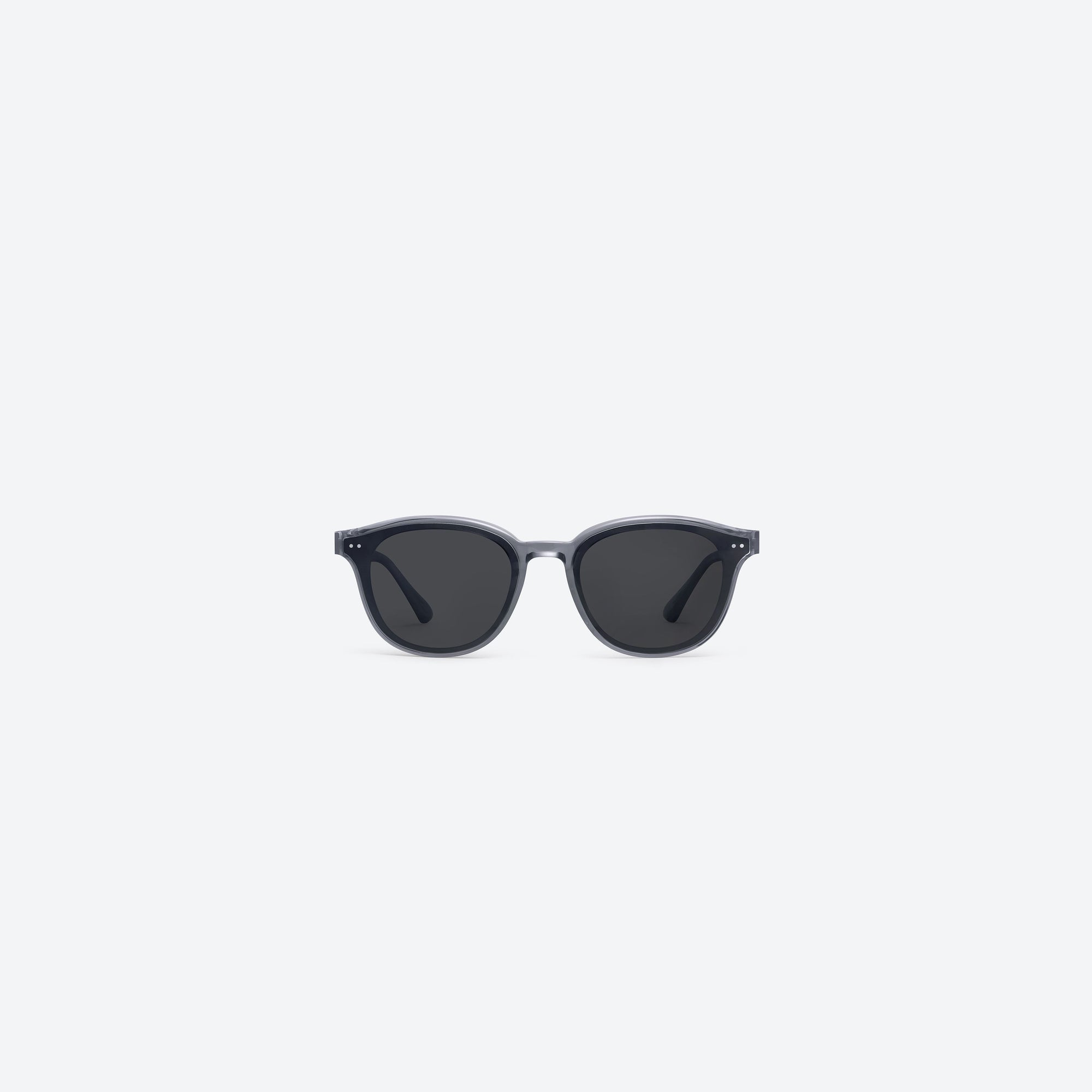 A front view of Gentle Monster Jade G1 Gray Acetate framed Round sunglasses.