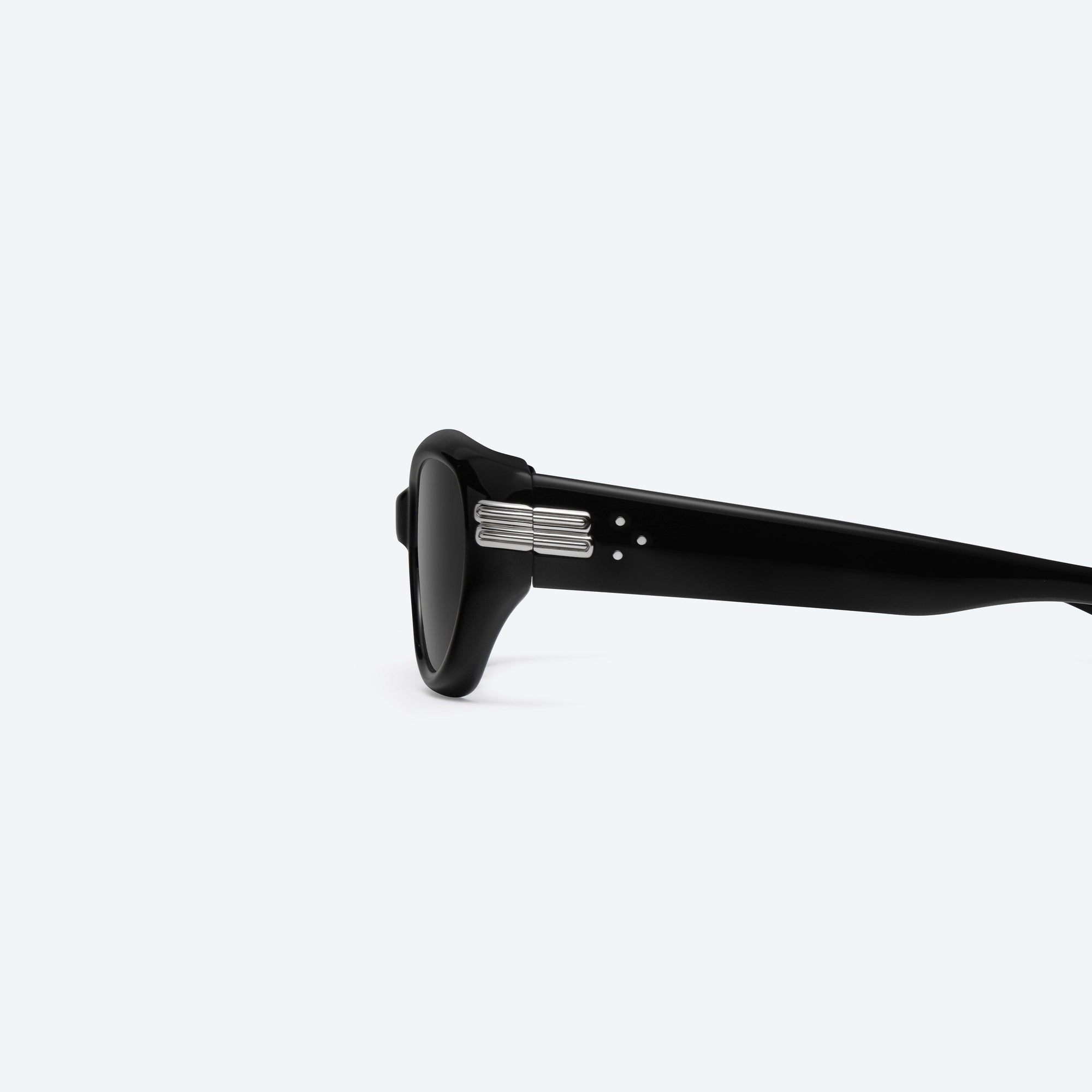 A detailed left view of Gentle Monster Kiko 01 Black Acetate framed Wraparound sunglasses.