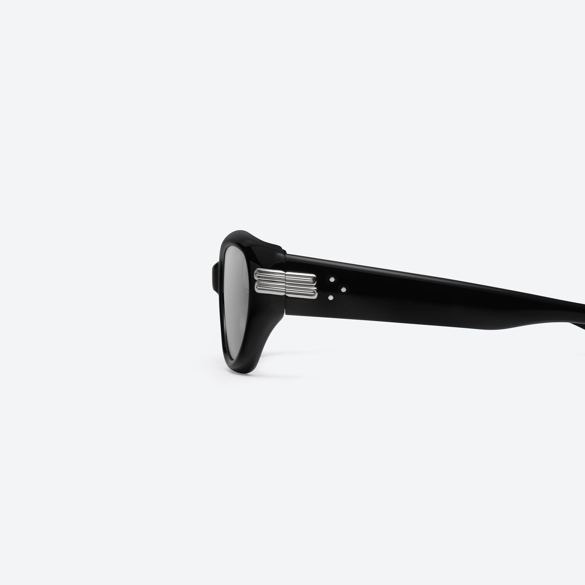 A detailed left view of Gentle Monster Kiko 01(SM) Black Acetate framed Wraparound sunglasses.