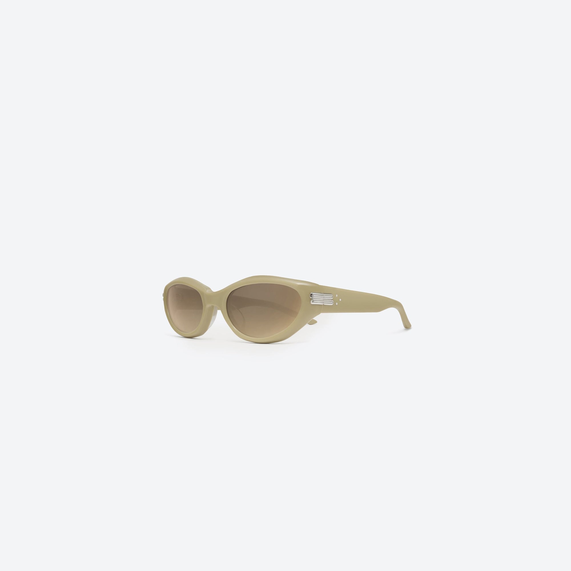 45-degree view of Gentle Monster Kiko Y10 Yellow Acetate framed Wraparound sunglasses.