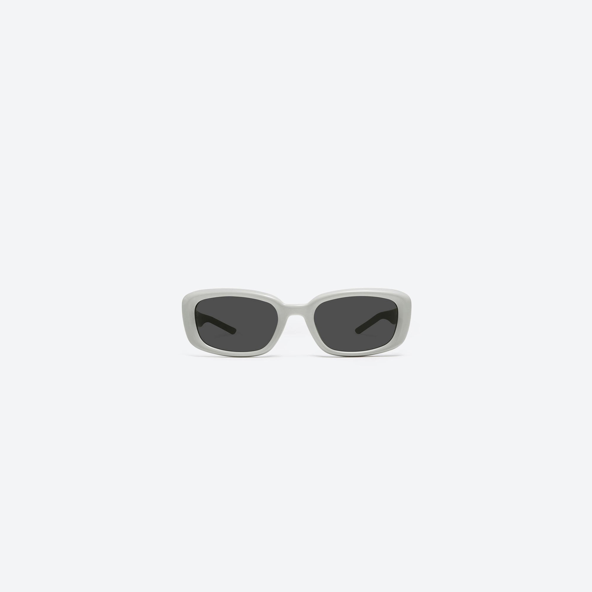A front view of Gentle Monster Lin G12 Gray Acetate framed Square sunglasses.