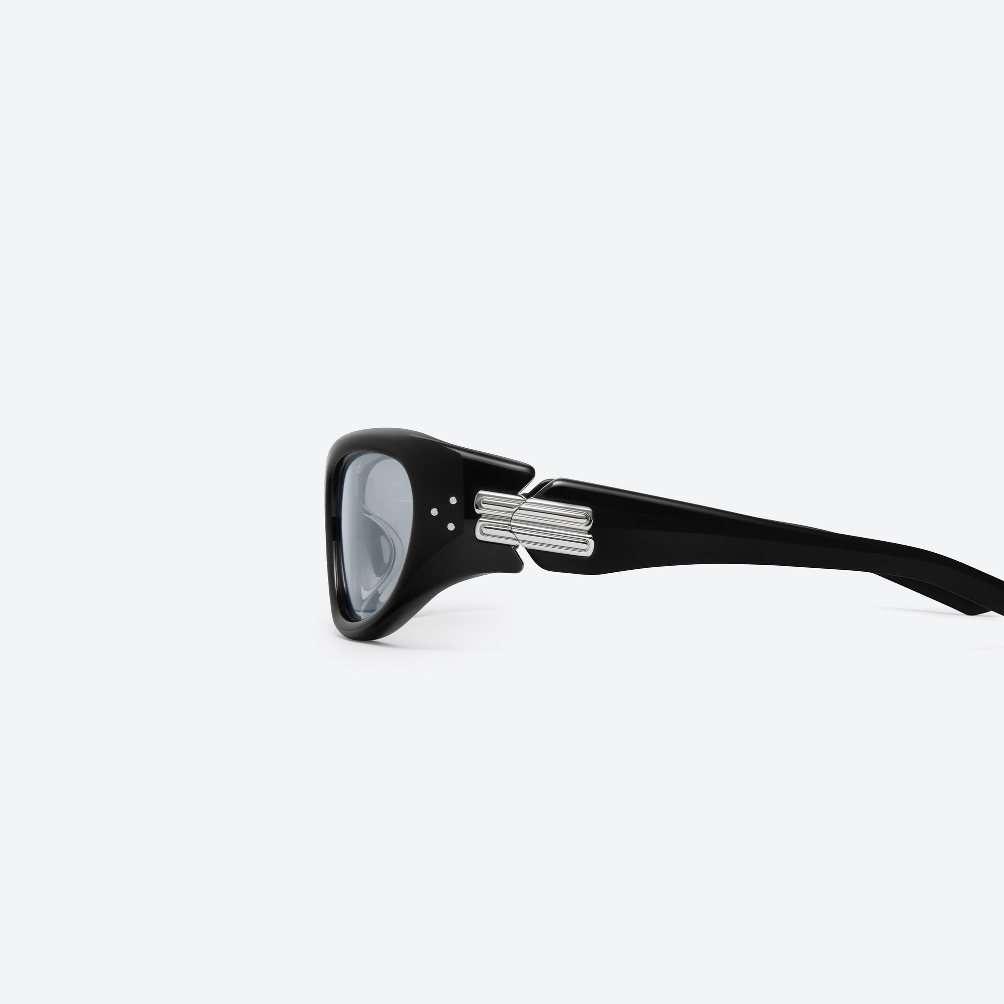 A detailed left view of Gentle Monster Memento 01(SM) Black Mixed framed Wraparound sunglasses.