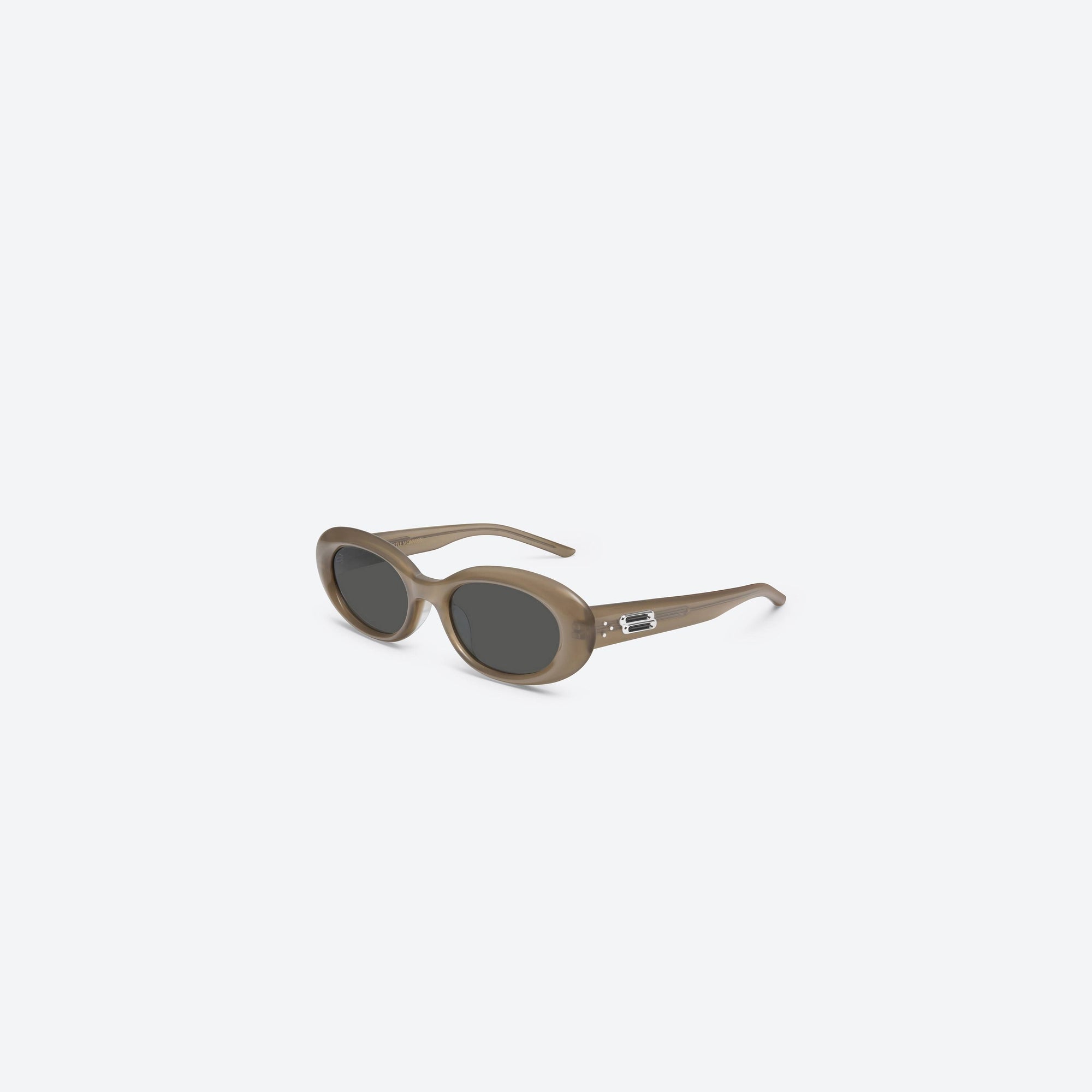 45-degree view of Gentle Monster Molta BRC9 Similar Brown Acetate framed Oval sunglasses.