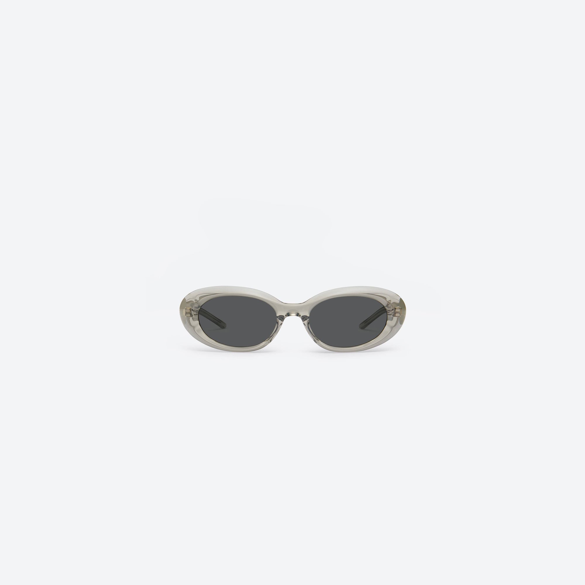 A front view of Gentle Monster Molta BRC11 Brown Acetate framed Oval sunglasses.