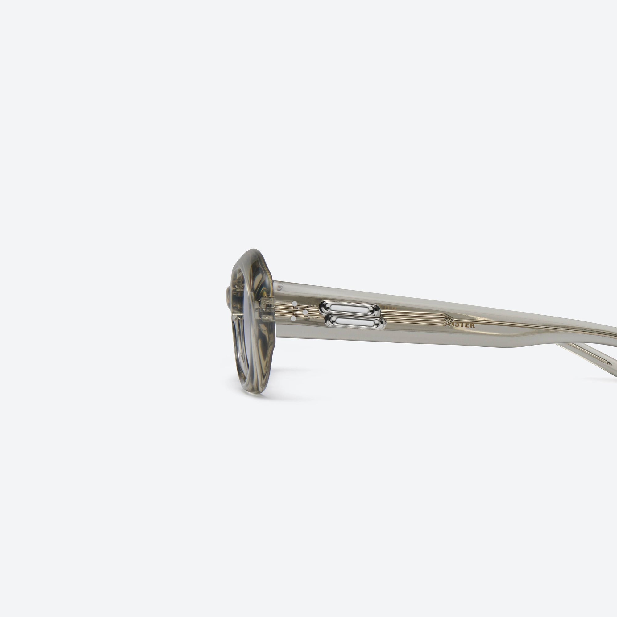 A detailed left view of Gentle Monster Molta BRC11 Brown Acetate framed Oval sunglasses.