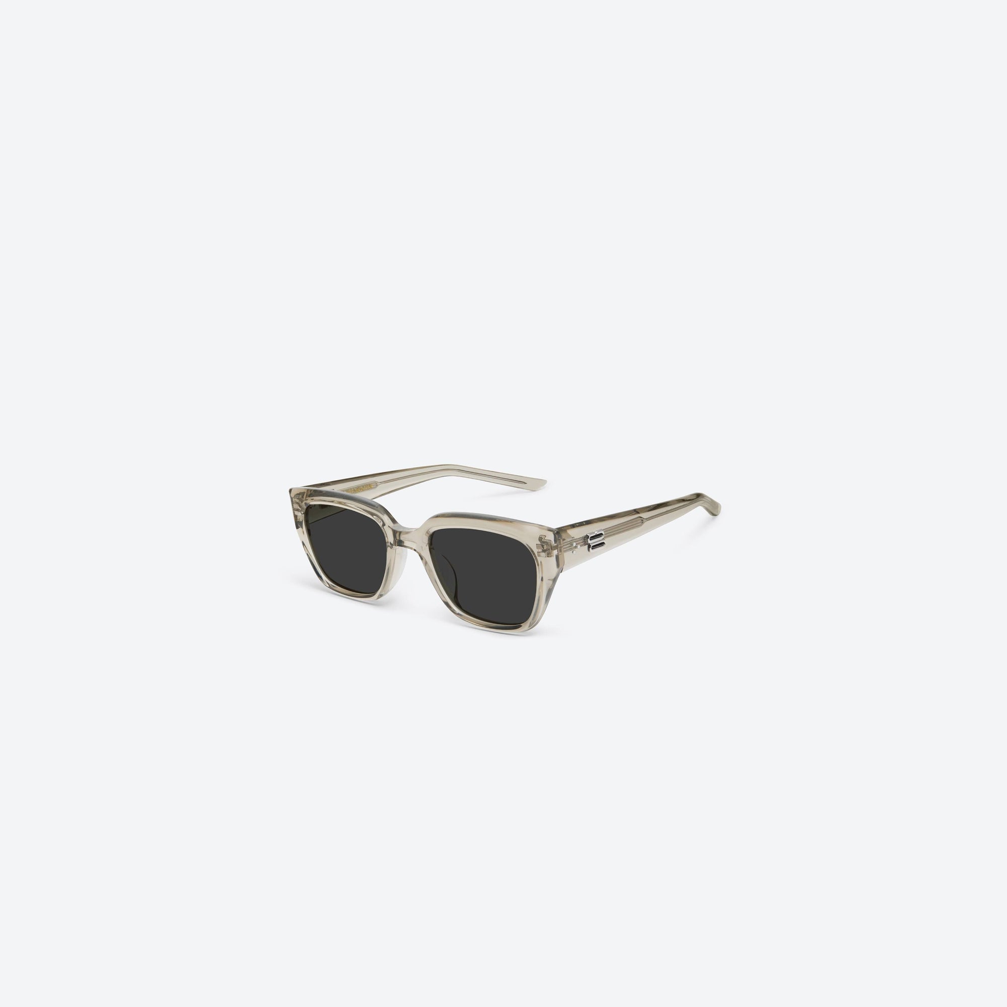 45-degree view of Gentle Monster Nabi BRC11 Brown Acetate framed Square sunglasses.