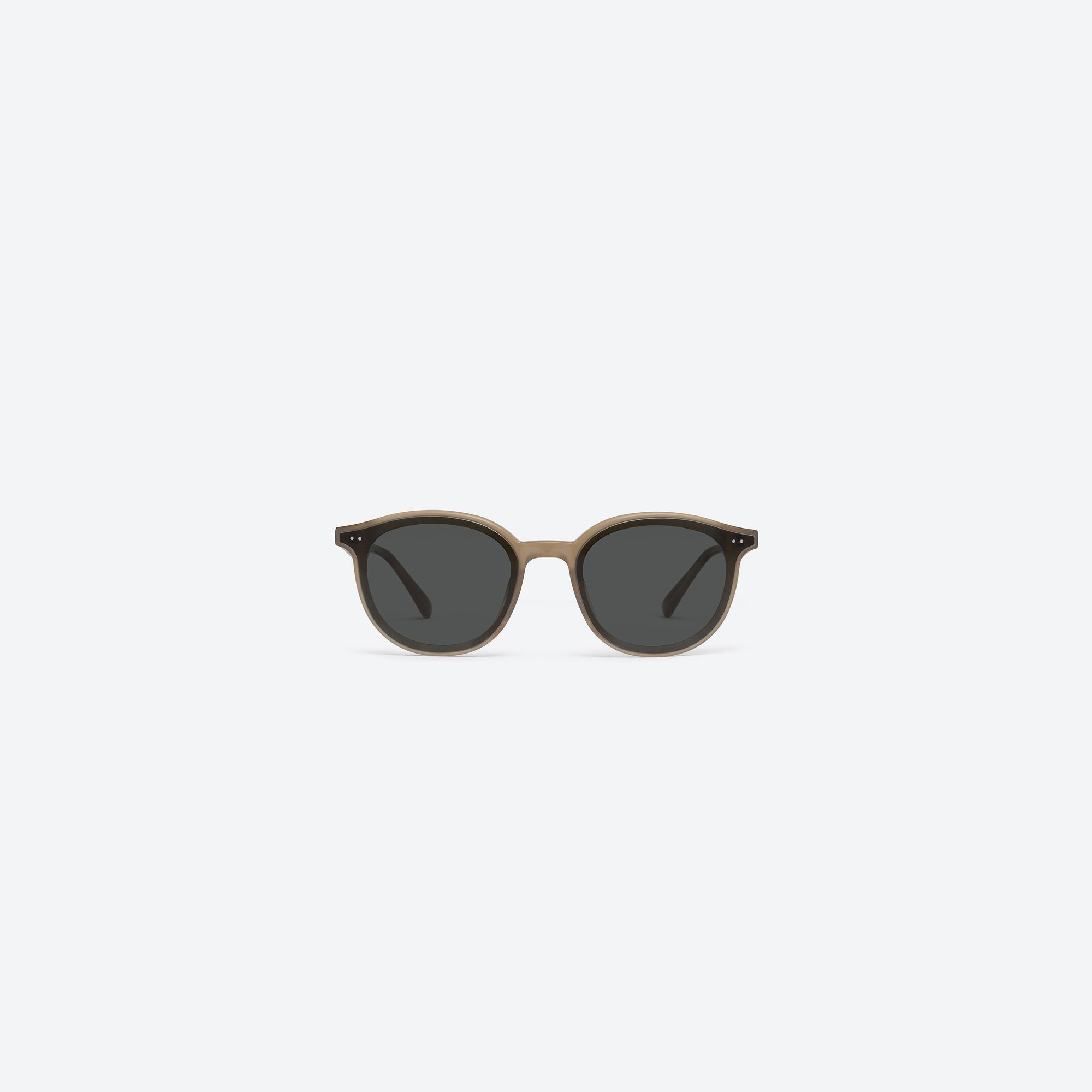 A front view of Gentle Monster New Born BRC9 Brown Acetate framed Round sunglasses.