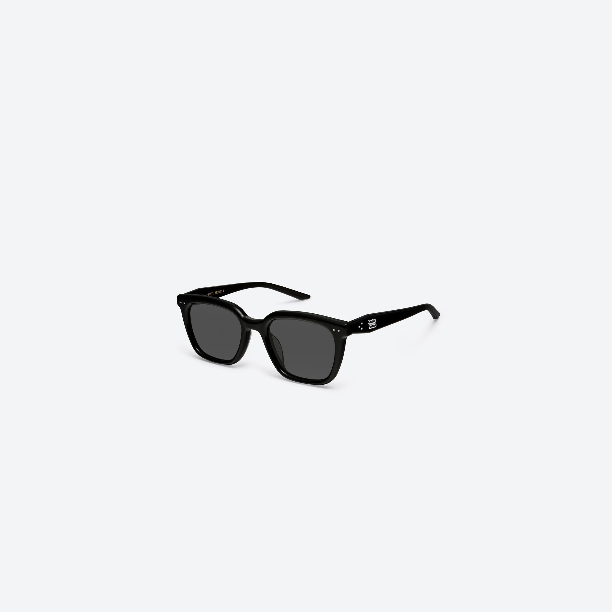 45-degree view of Gentle Monster Nubo 01 Black Acetate framed Square sunglasses.