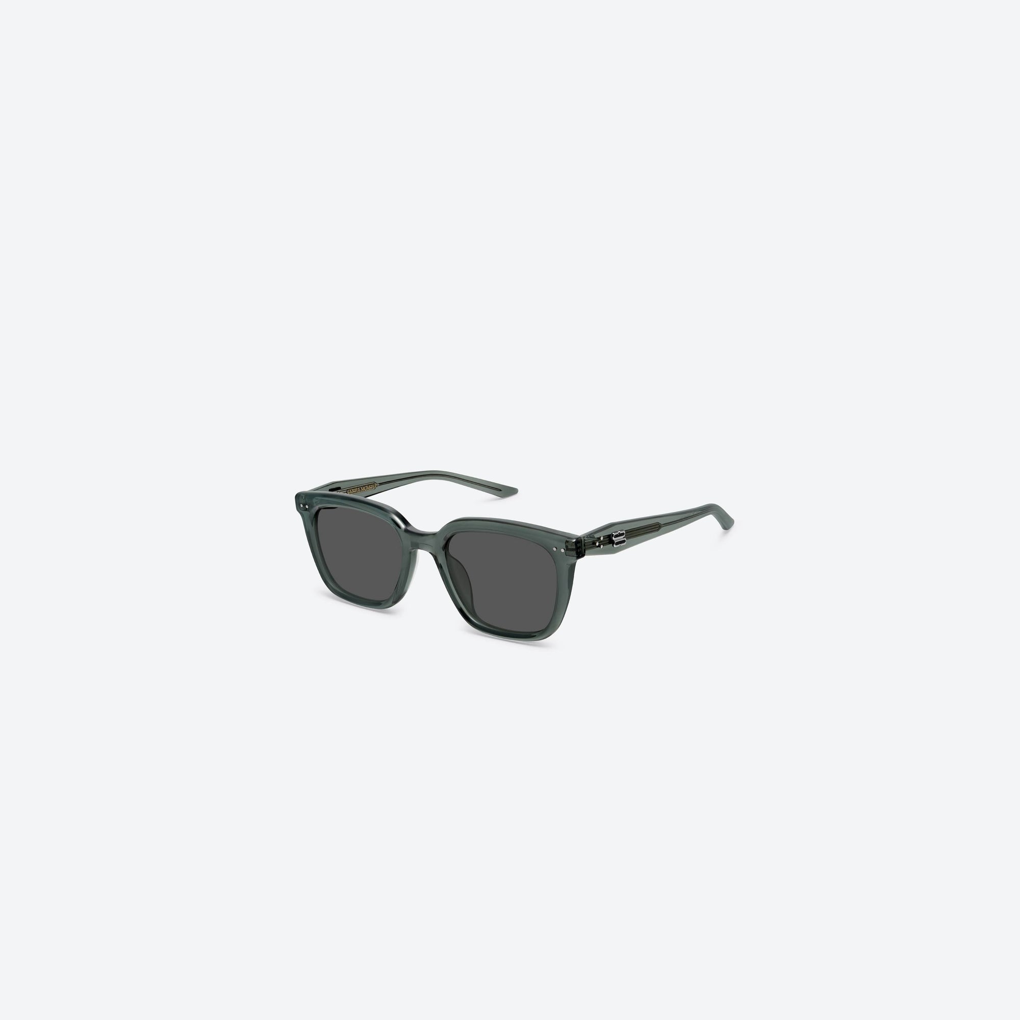 45-degree view of Gentle Monster Nubo G3 Gray Acetate framed Square sunglasses.