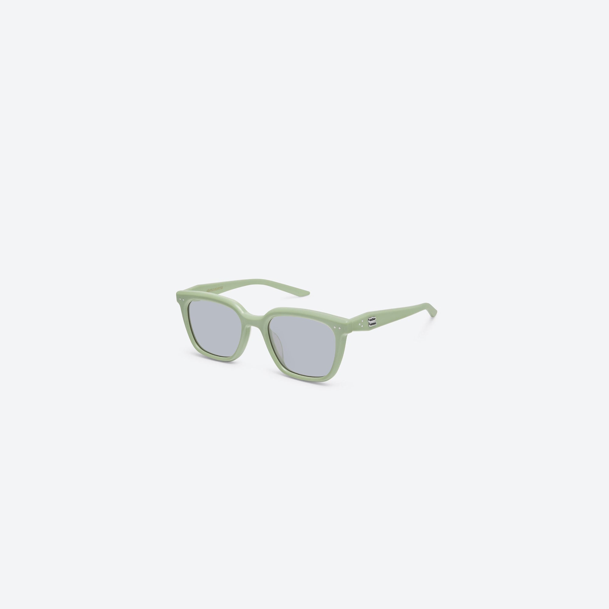 45-degree view of Gentle Monster Nubo GR8 Green Acetate framed Square sunglasses.