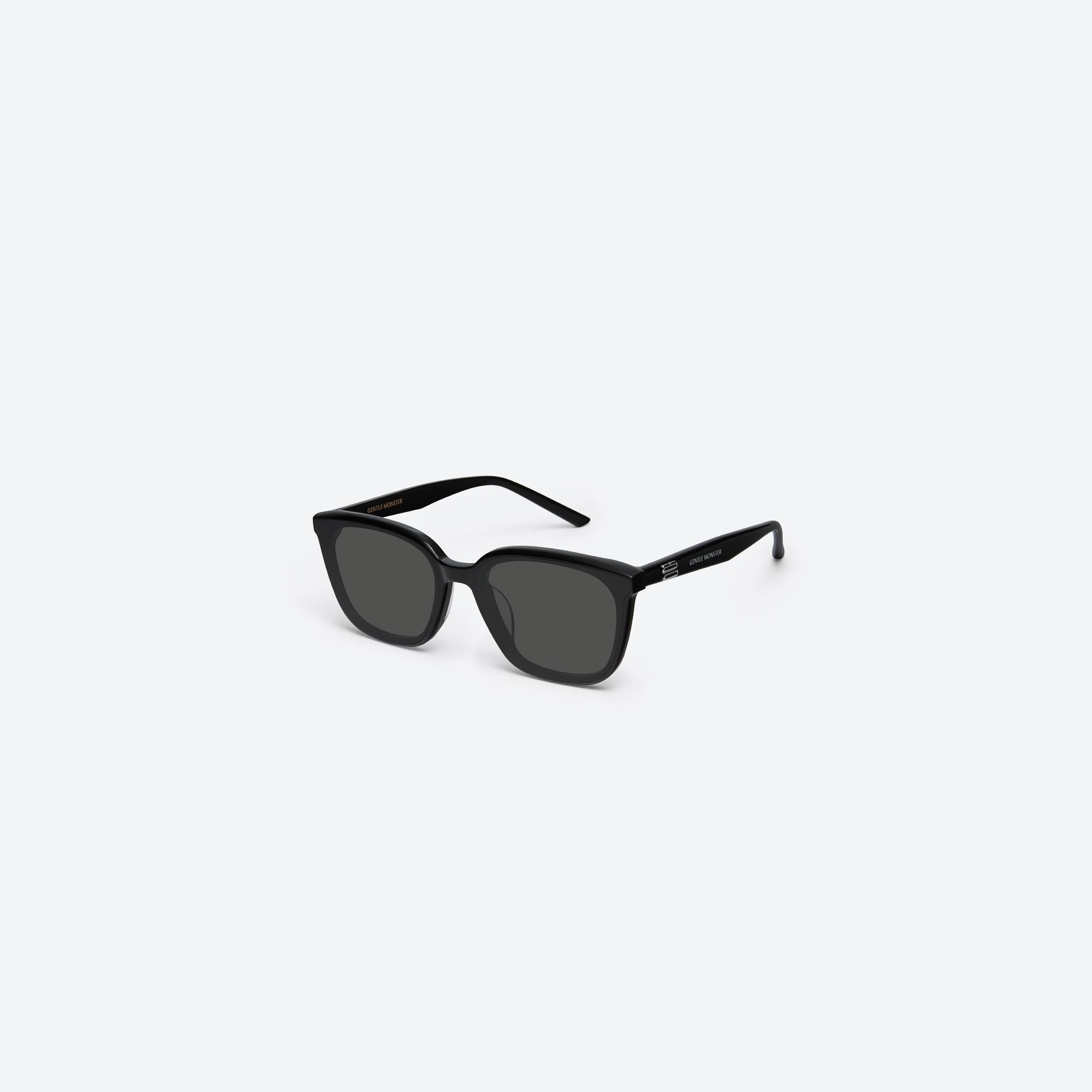 45-degree view of Gentle Monster Pino 01 Black Acetate framed Square sunglasses.