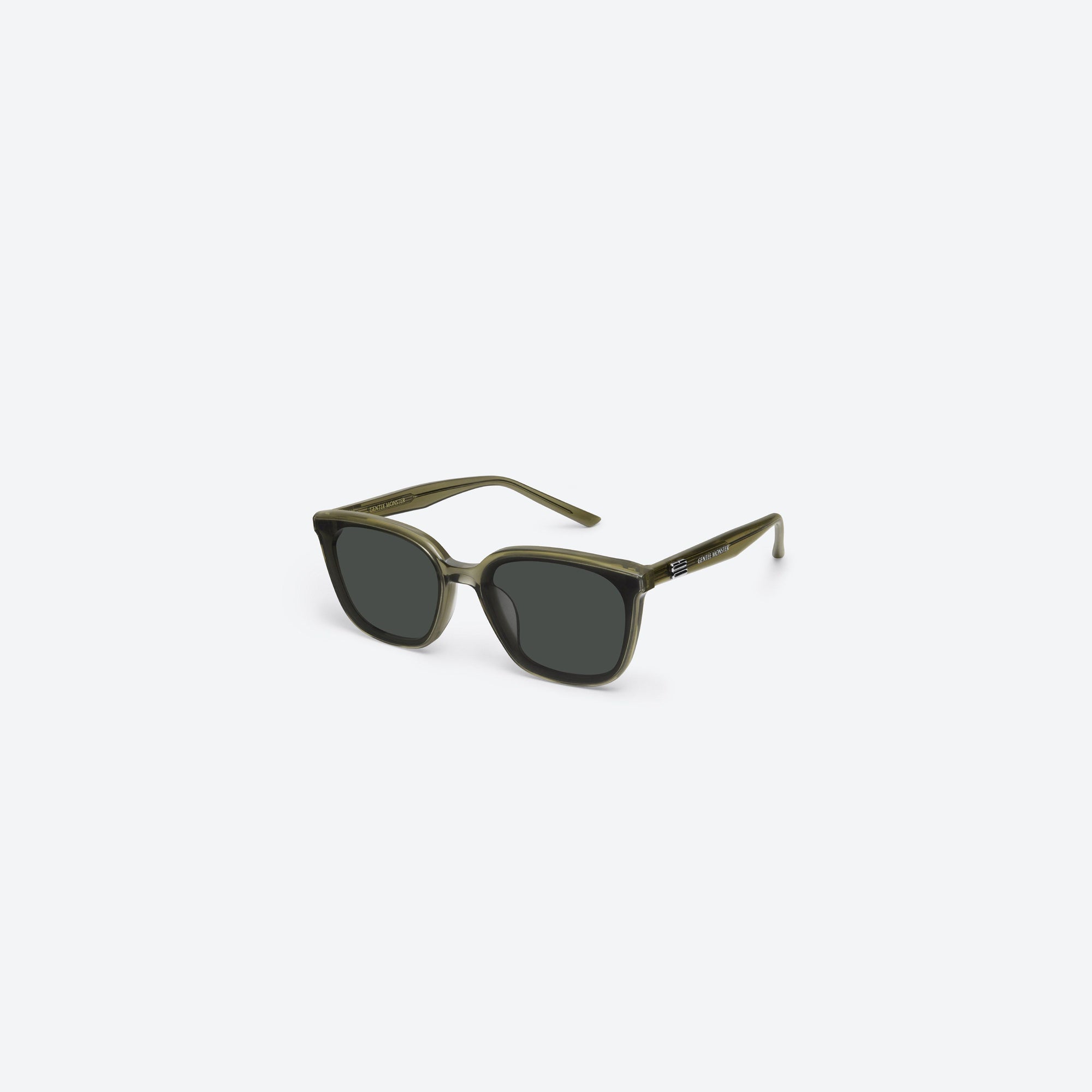 45-degree view of Gentle Monster Pino KC1 Green Acetate framed Square sunglasses.