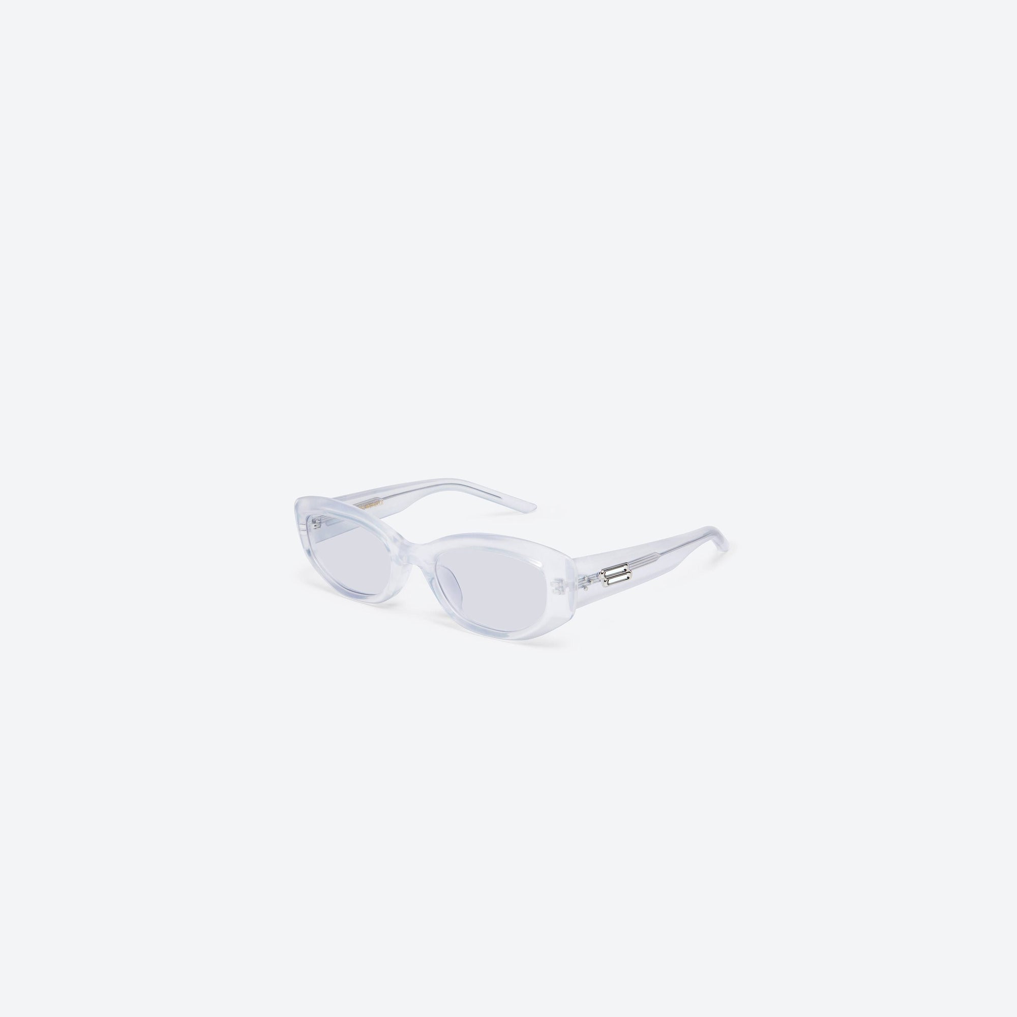 45-degree view of Gentle Monster Row WC7 White Acetate framed Square sunglasses.