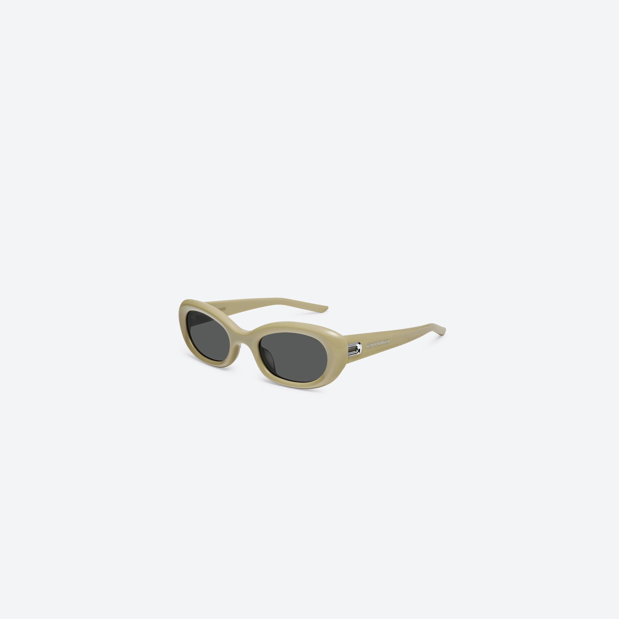 45-degree view of Gentle Monster Savage Y10 Yellow Acetate framed Square sunglasses.