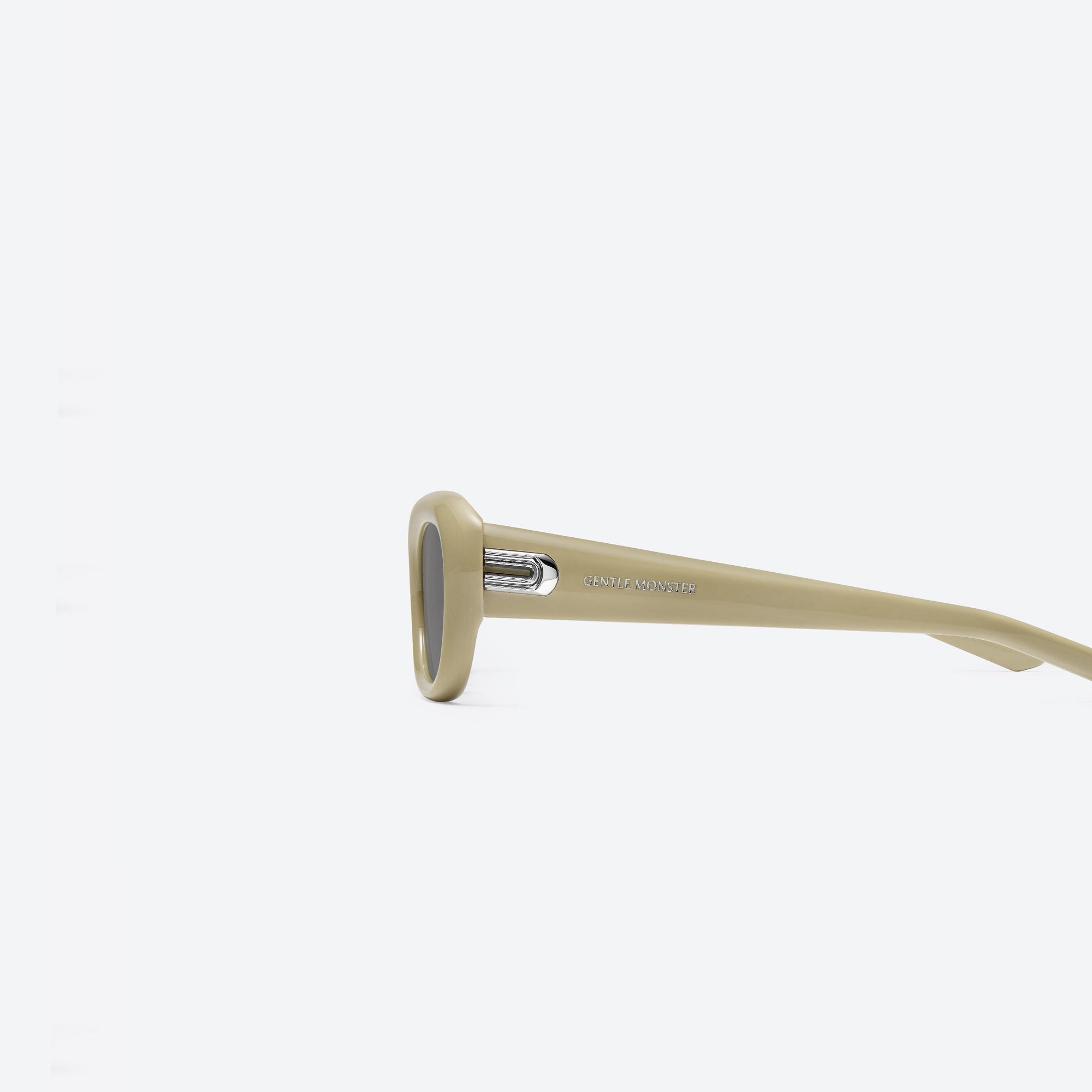 A detailed left view of Gentle Monster Savage Y10 Yellow Acetate framed Square sunglasses.