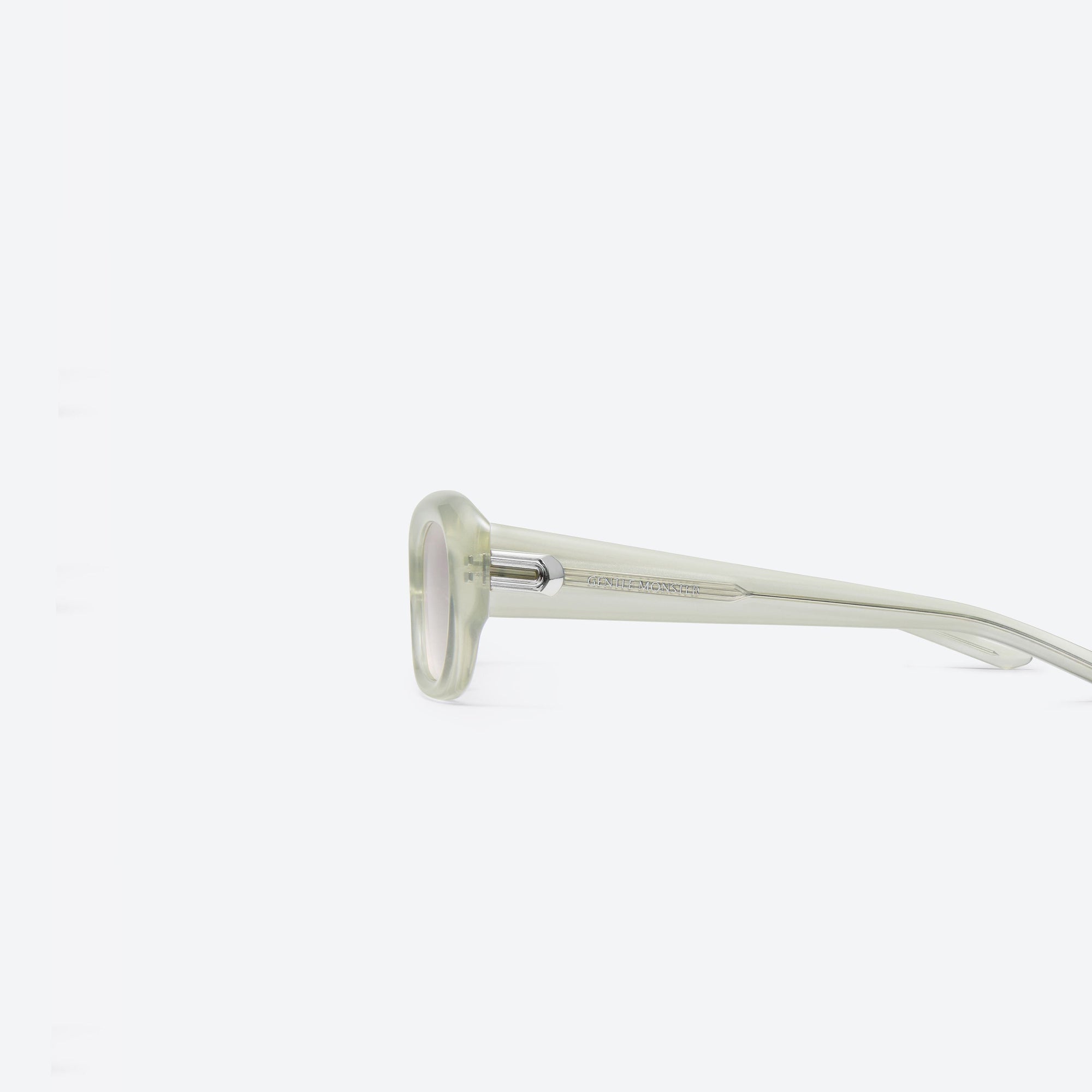 A detailed left view of Gentle Monster Savage GC10 Gray Acetate framed Square sunglasses.