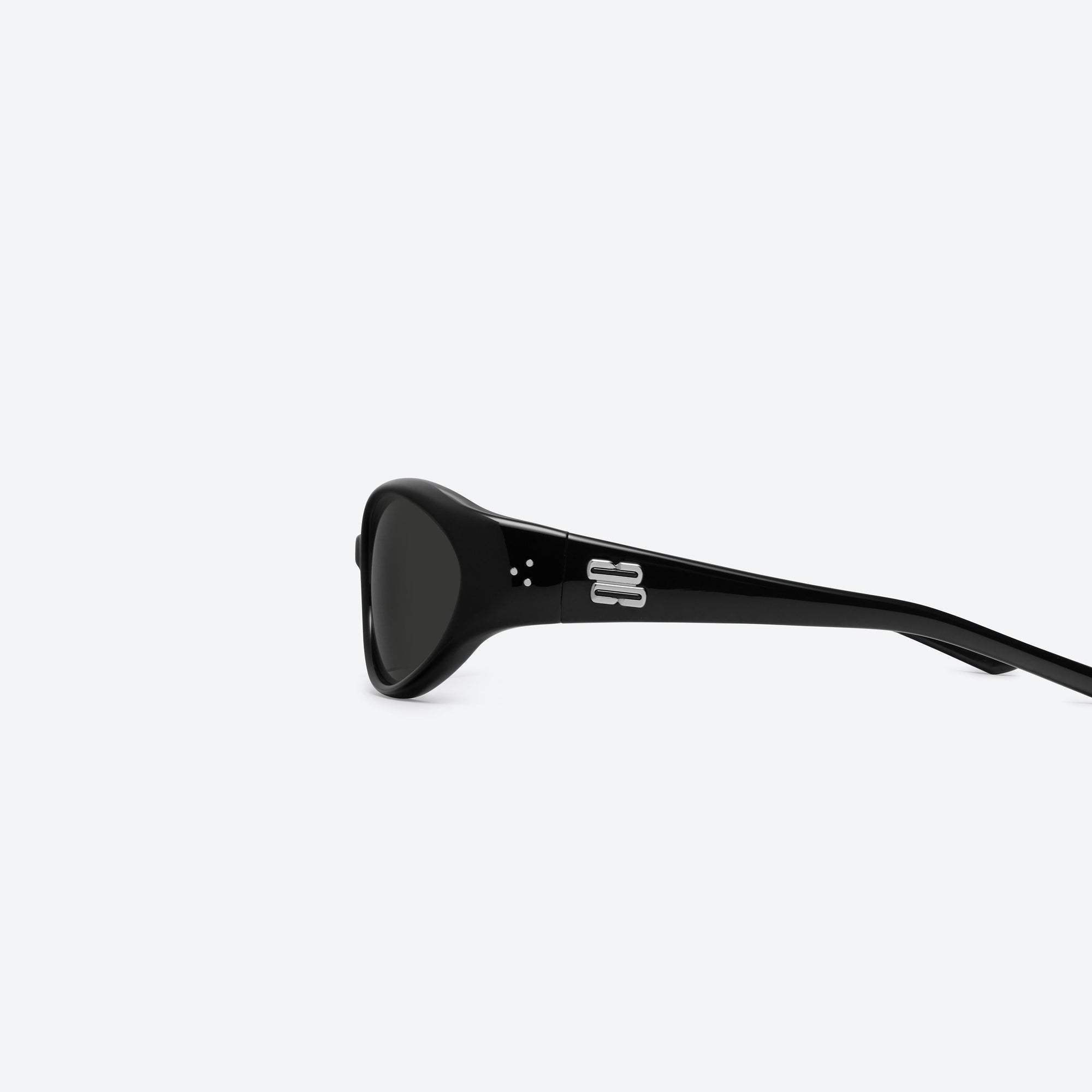 A detailed left view of Gentle Monster Sphere 01 Black Acetate framed Wraparound sunglasses.