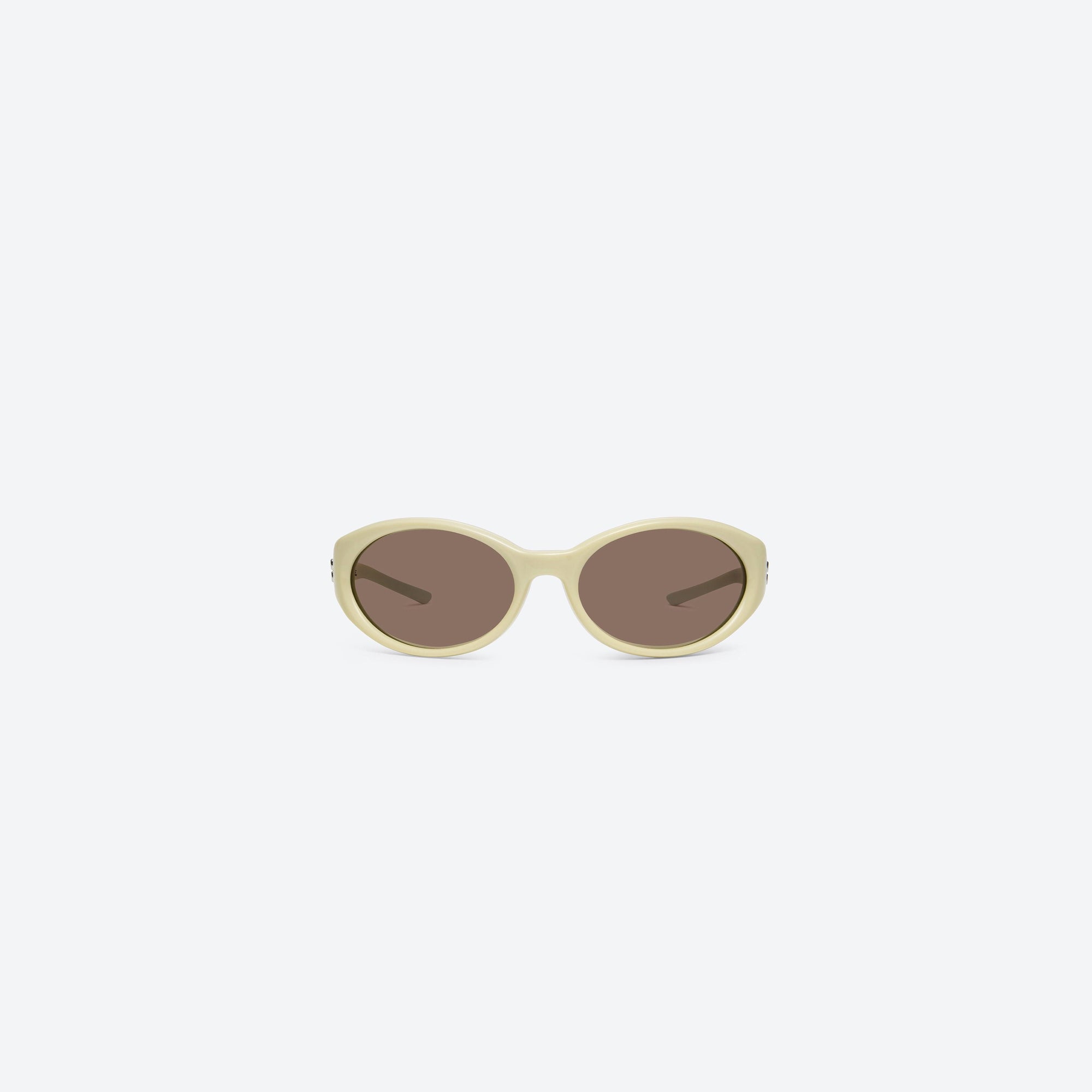 A front view of Gentle Monster Sphere Y5 Yellow Acetate framed Wraparound sunglasses.