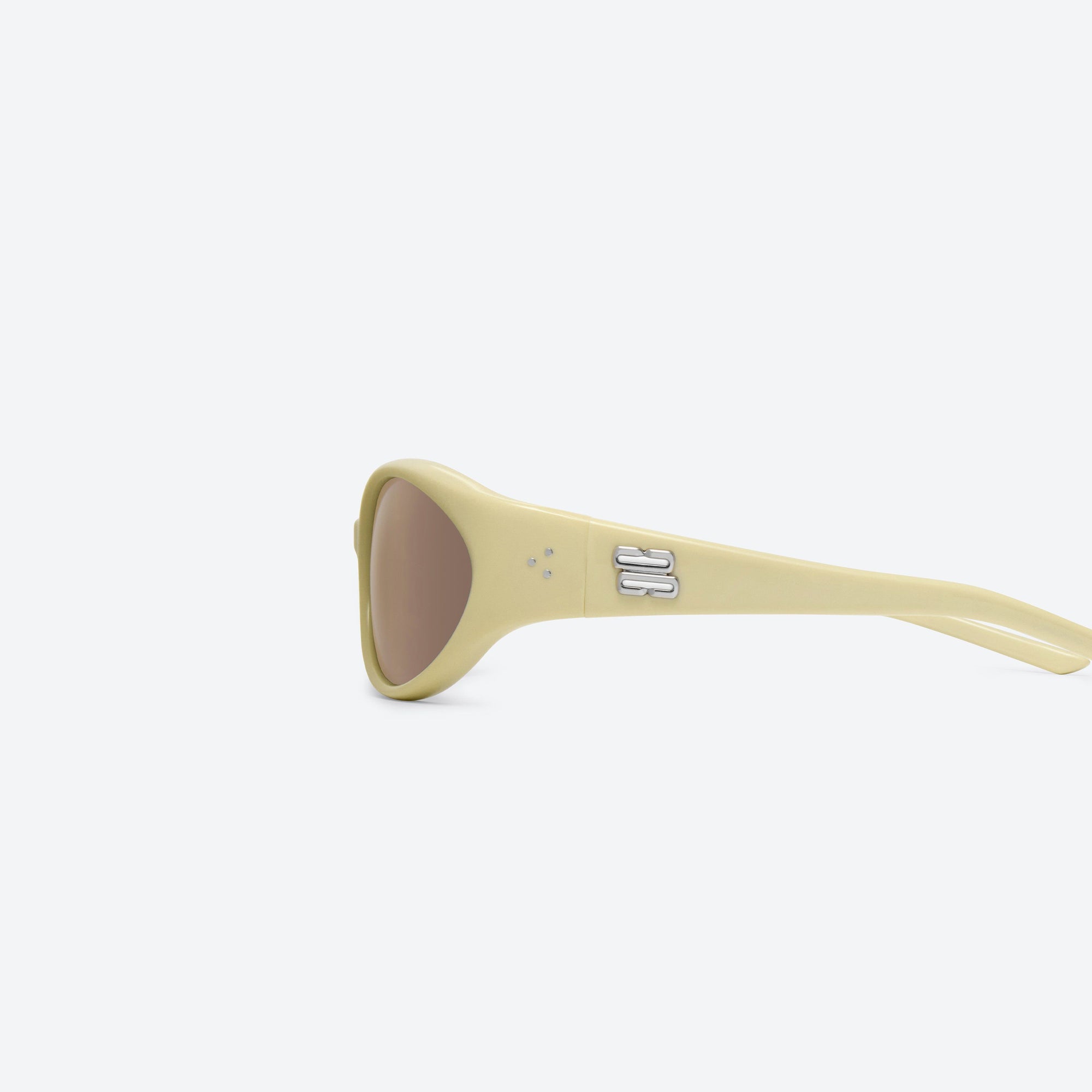 A detailed left view of Gentle Monster Sphere Y5 Yellow Acetate framed Wraparound sunglasses.