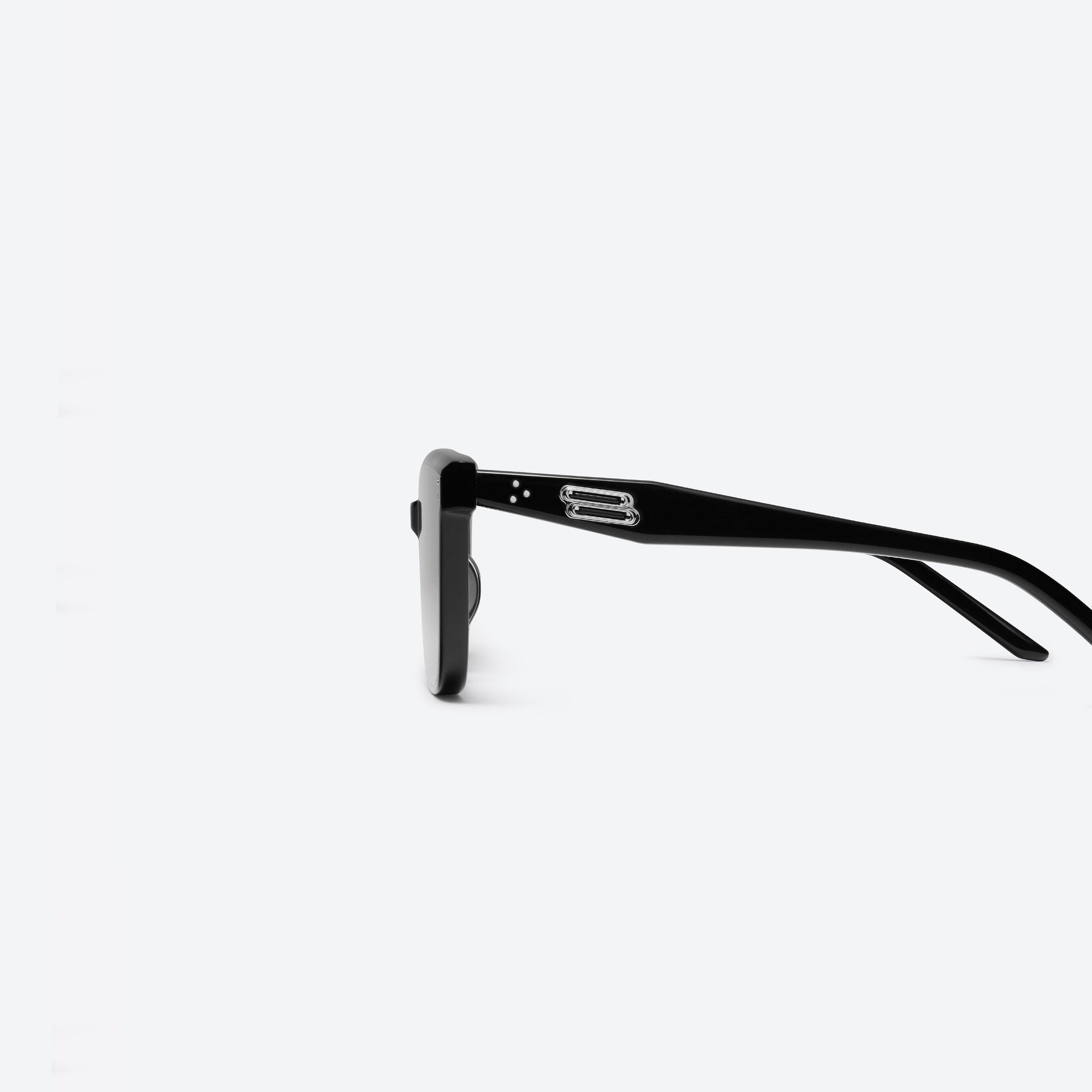 A detailed left view of Gentle Monster Tote 01 Black Acetate framed Square sunglasses.