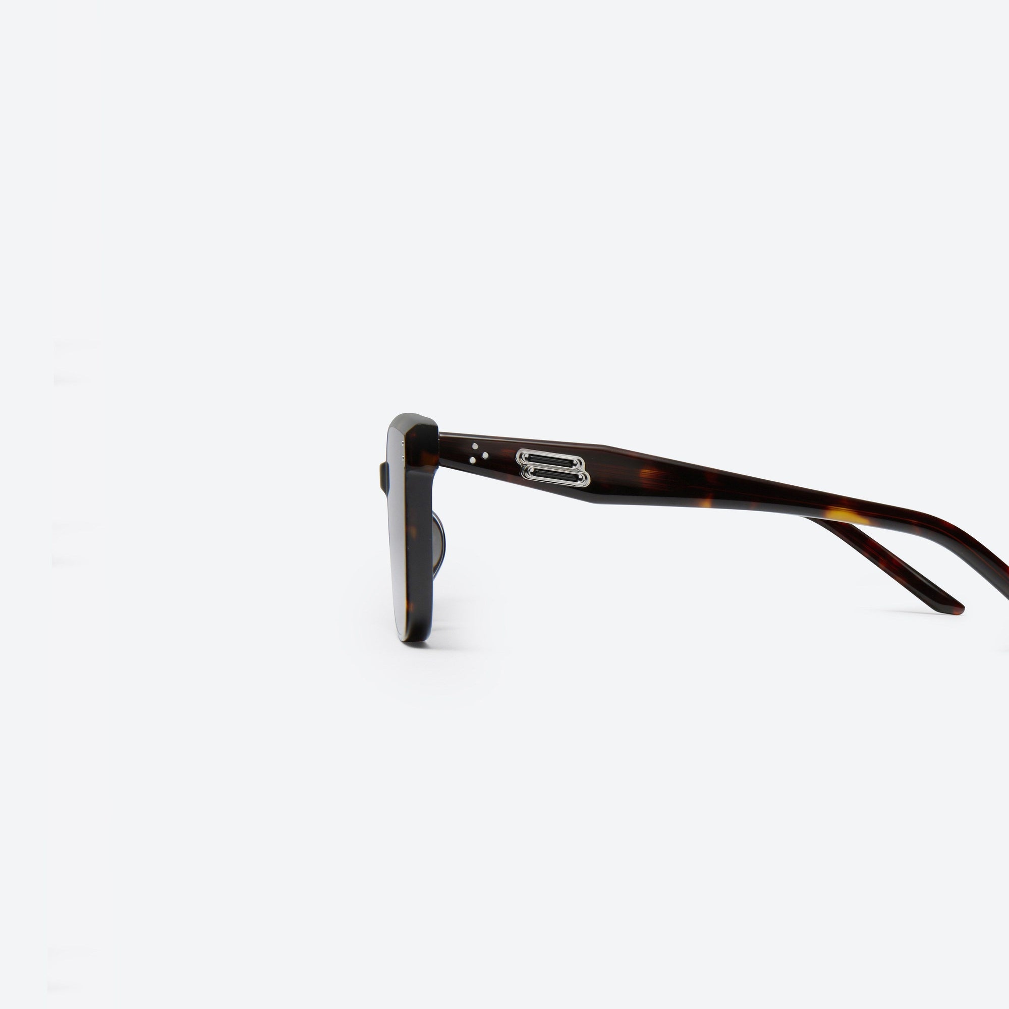 A detailed left view of Gentle Monster Tote T1 Tortoise Acetate framed Square sunglasses.