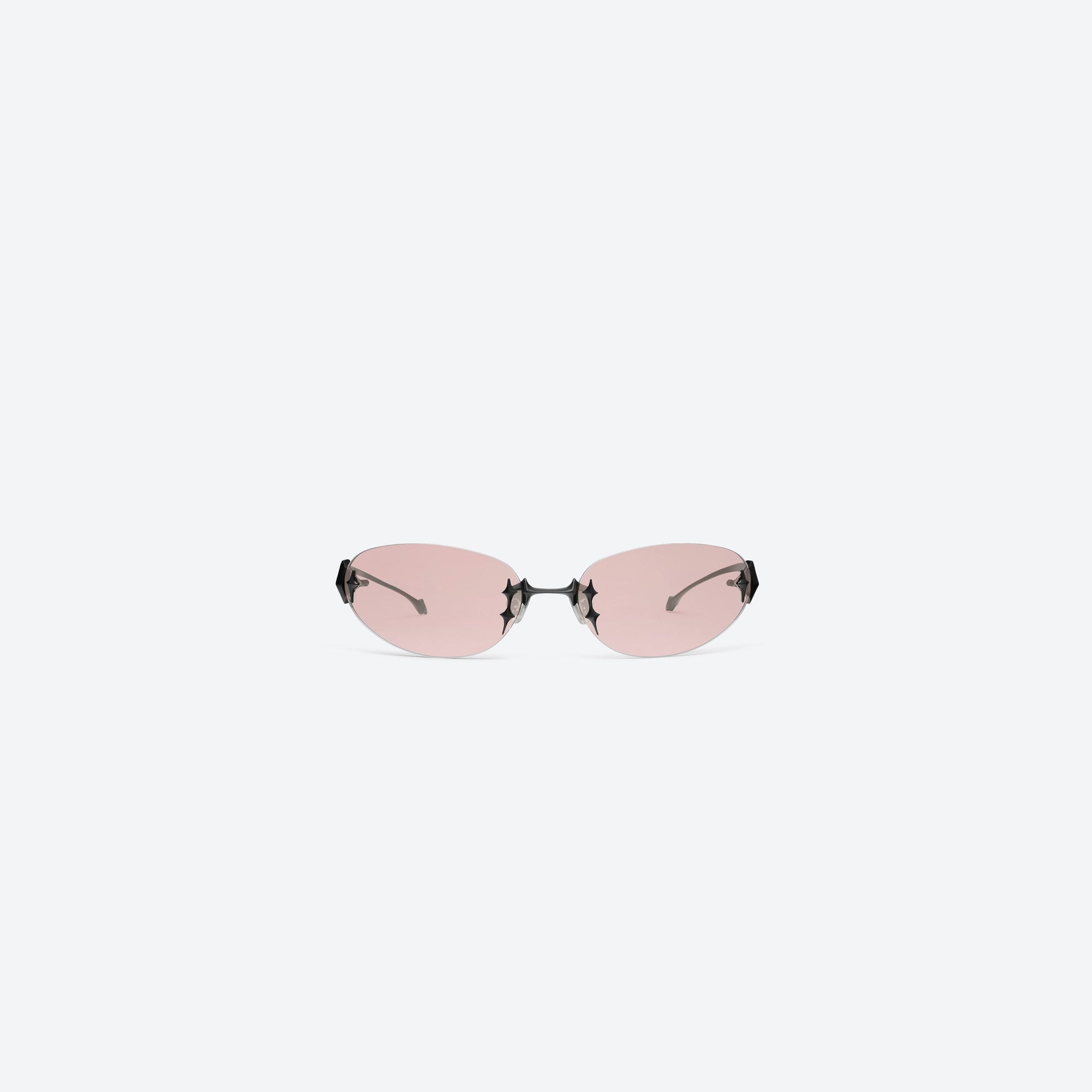 A front view of Gentle Monster Tta 01 Black Metal framed Oval sunglasses.