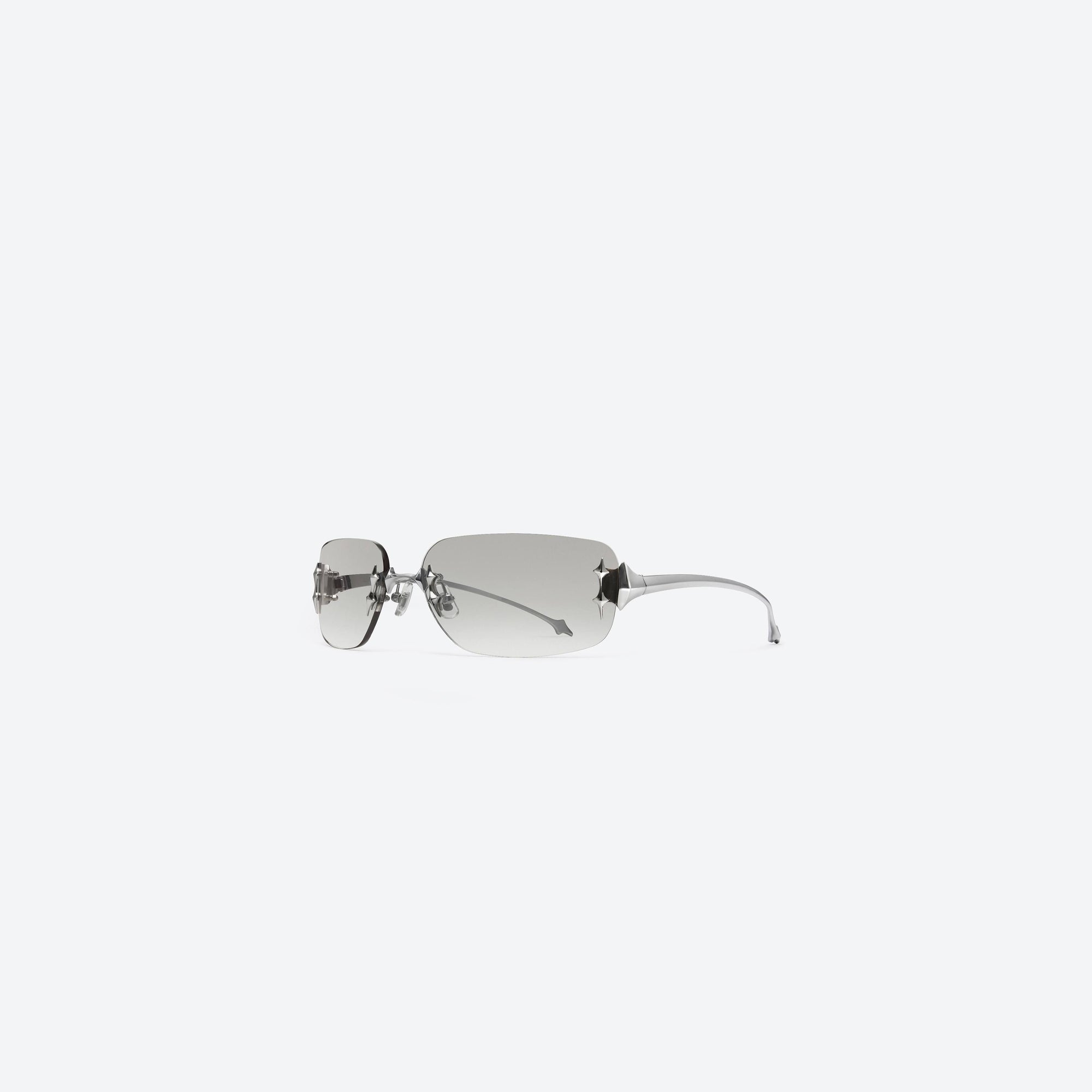 45-degree view of Gentle Monster Ttl 02(BRG) Silver Metal framed Square sunglasses.