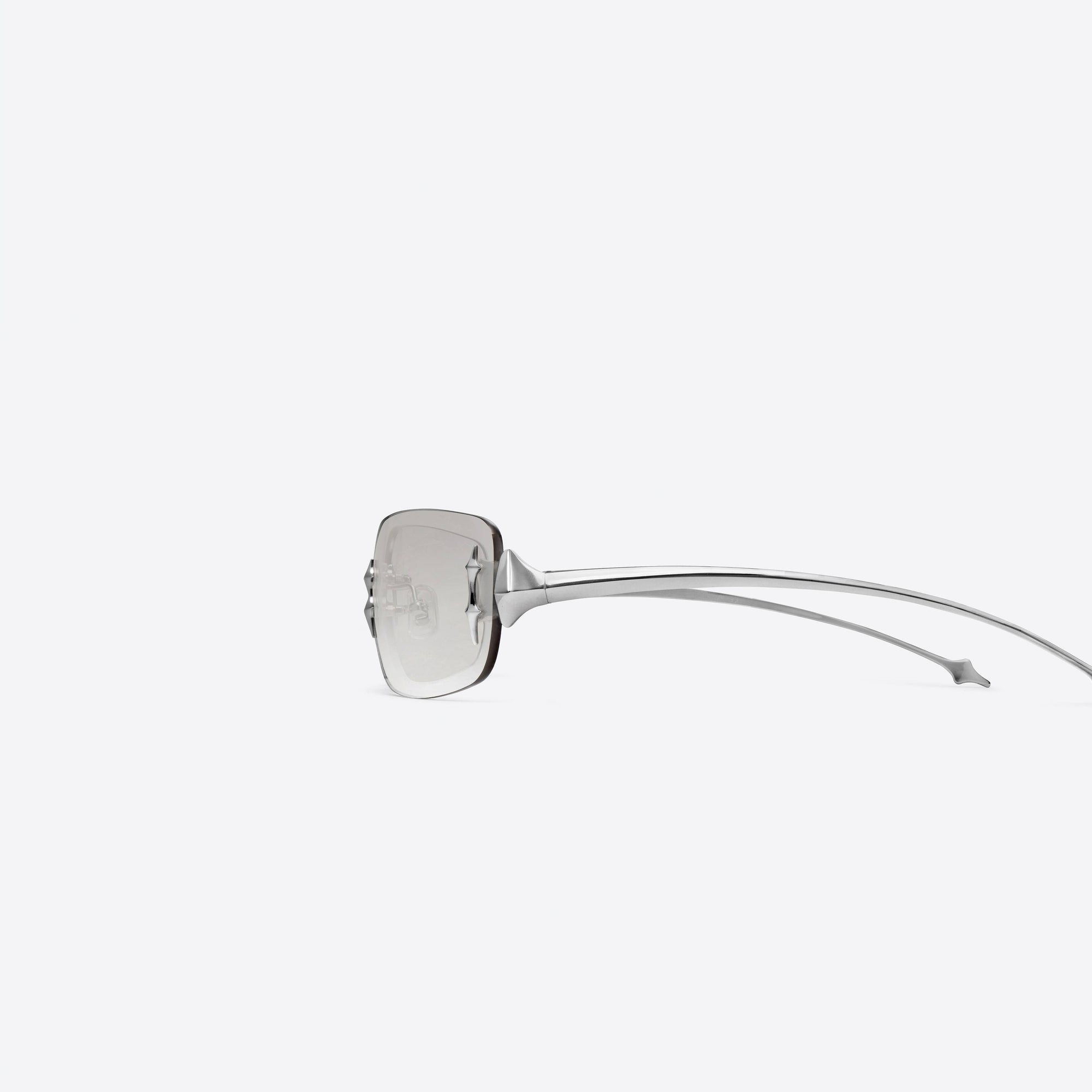 A detailed left view of Gentle Monster Ttl 02(BRG) Silver Metal framed Square sunglasses.