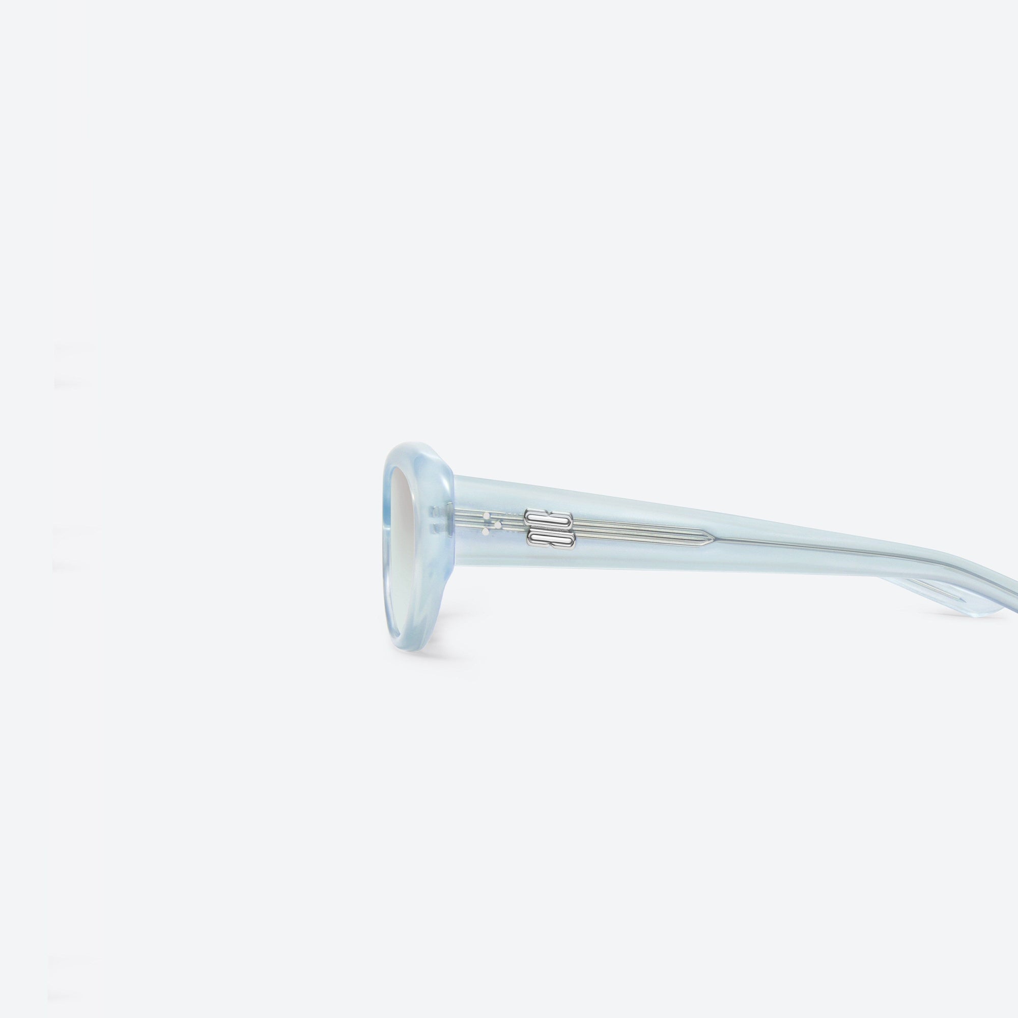 A detailed left view of Gentle Monster Umber BLC7 Blue Acetate framed Oval sunglasses.