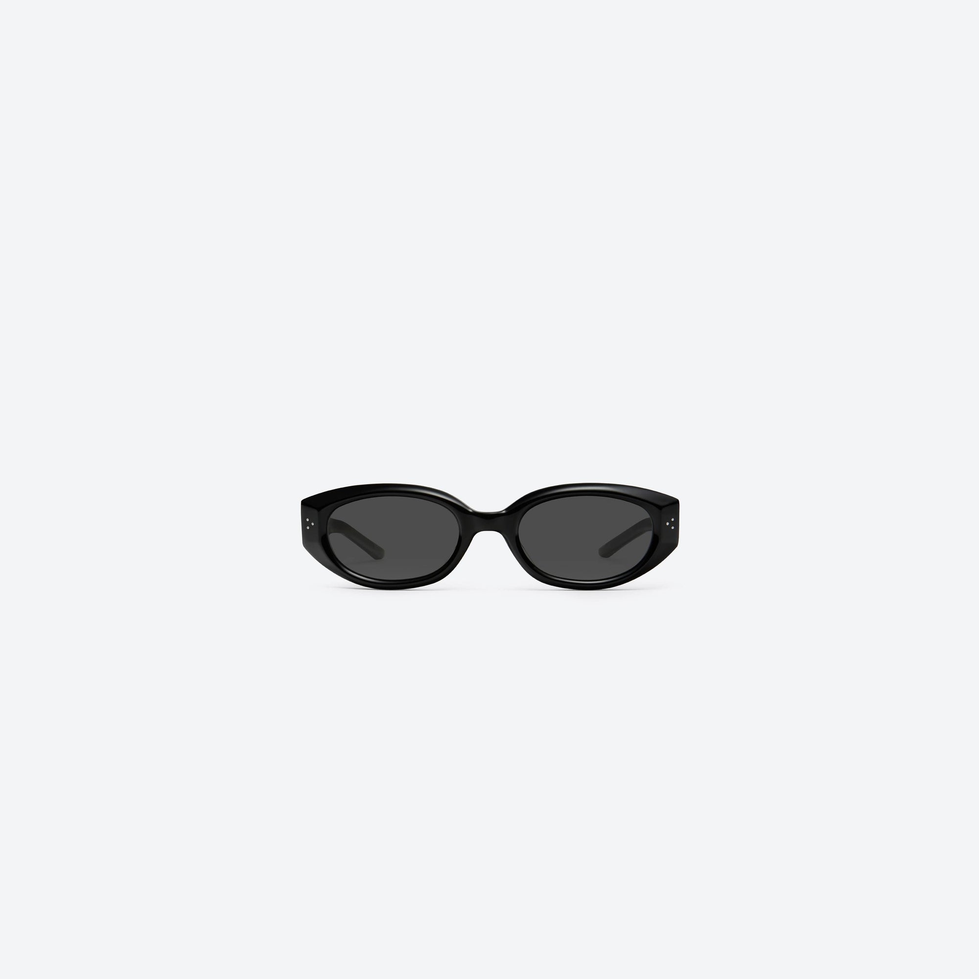 A front view of Gentle Monster Void 01 Black Acetate framed Oval sunglasses.