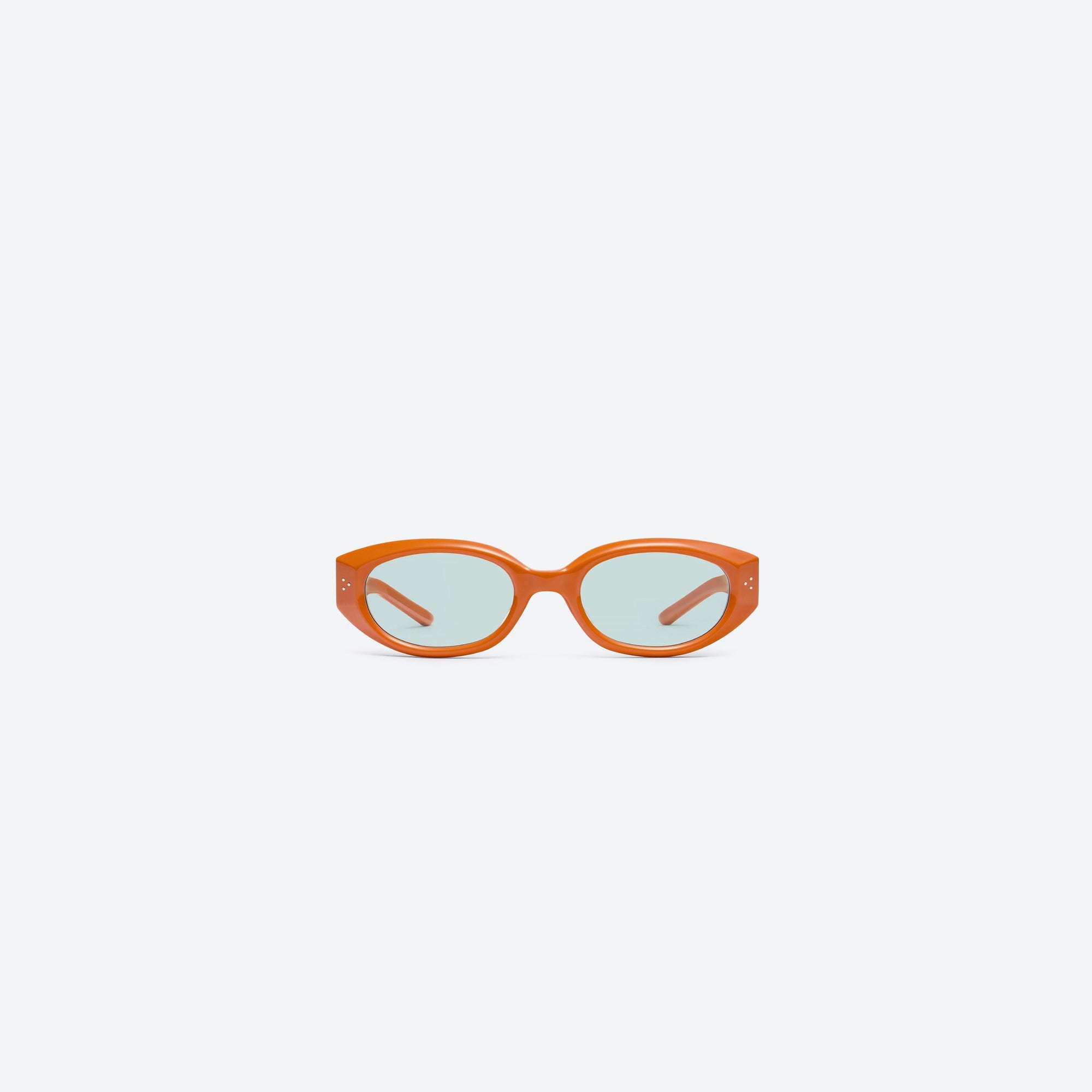 A front view of Gentle Monster Void OR3 Orange Acetate framed Oval sunglasses.
