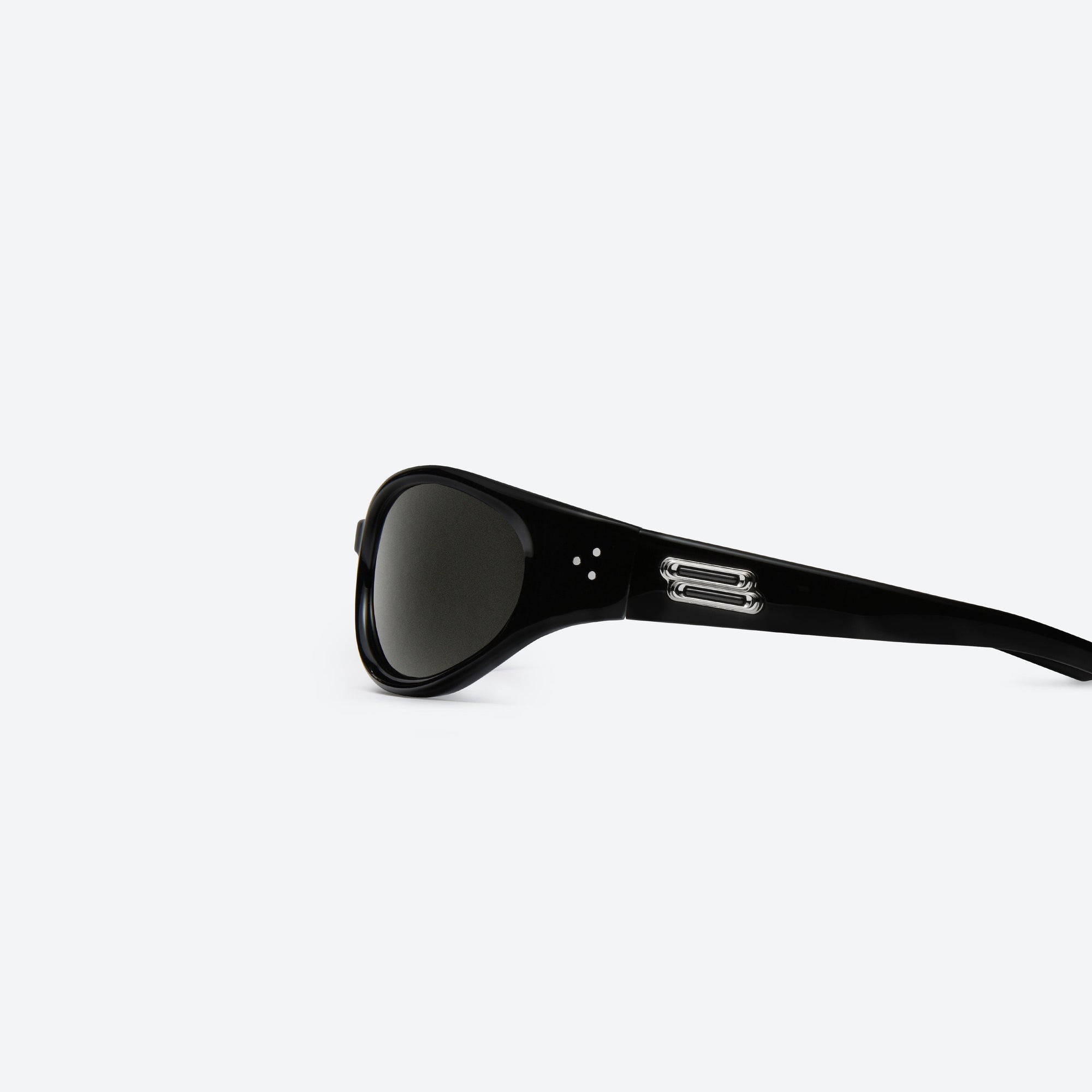 A detailed left view of Gentle Monster Young 01 Black Acetate framed Wraparound sunglasses.