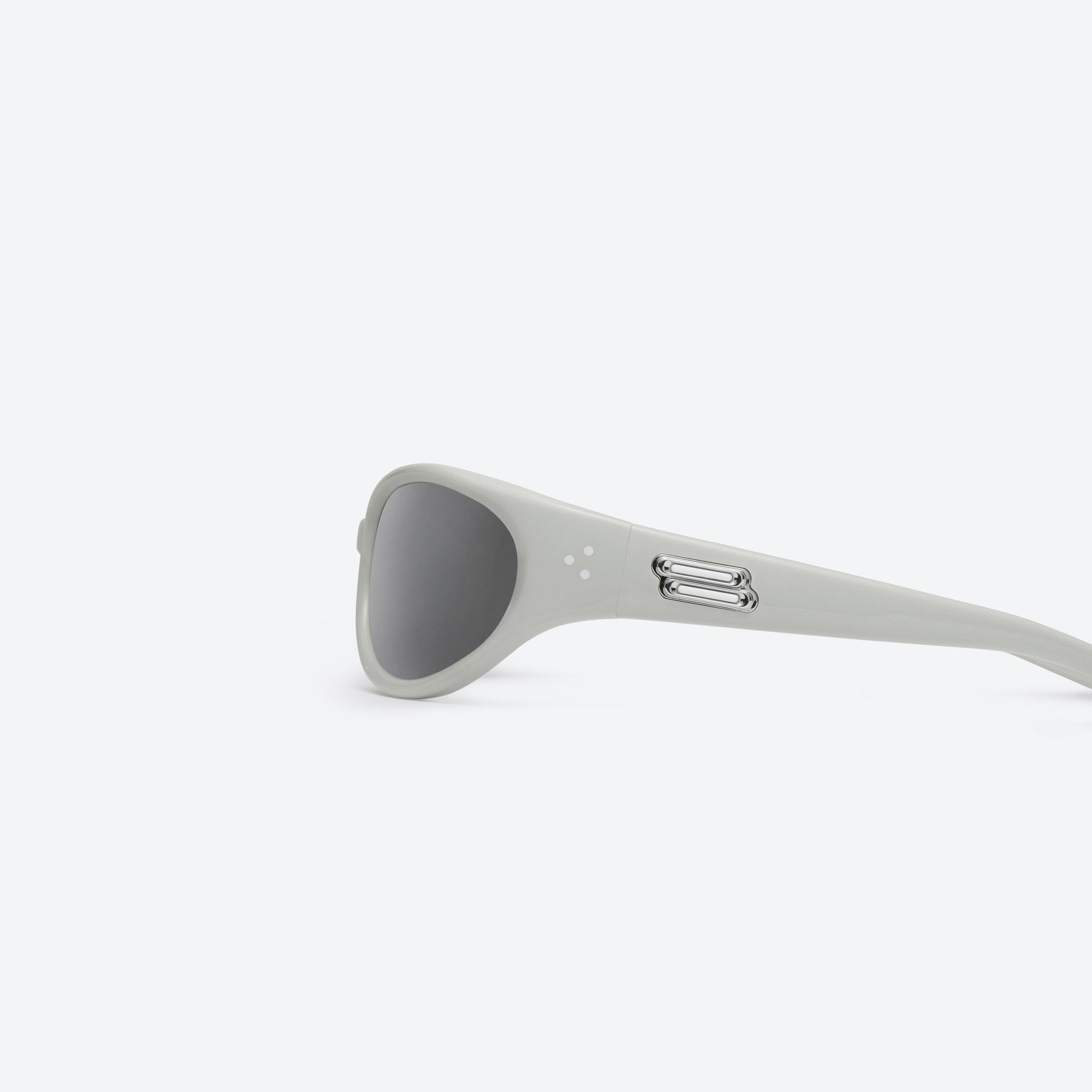 A detailed left view of Gentle Monster Young G12 Gray Acetate framed Wraparound sunglasses.